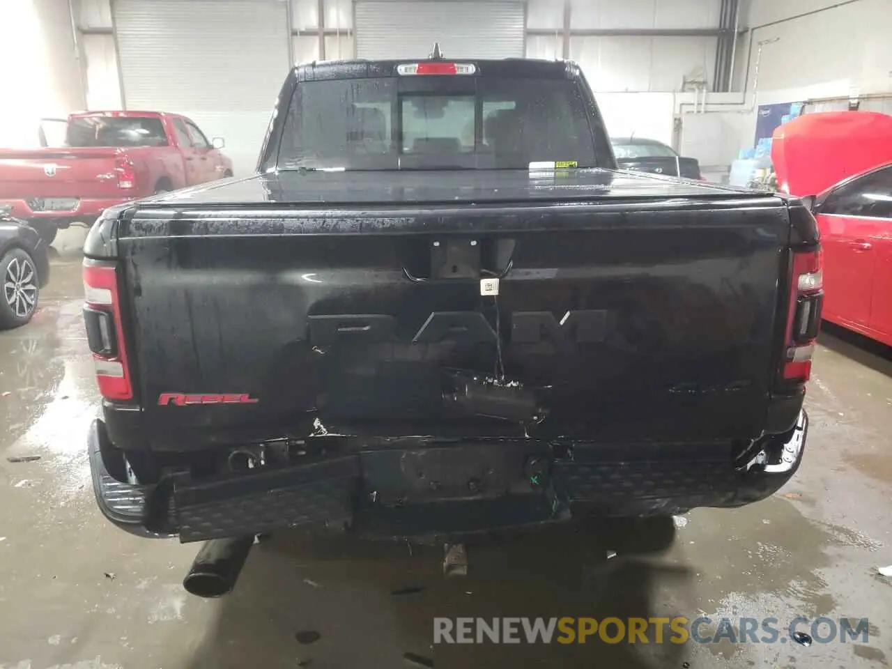 6 Photograph of a damaged car 1C6SRFLT0LN293467 RAM 1500 2020