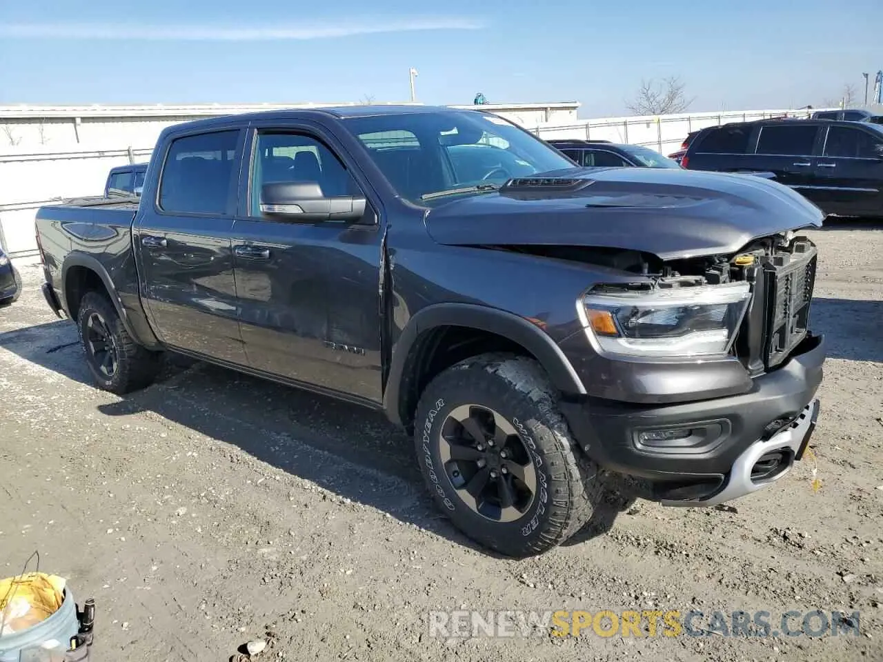 4 Photograph of a damaged car 1C6SRFLT1LN148339 RAM 1500 2020