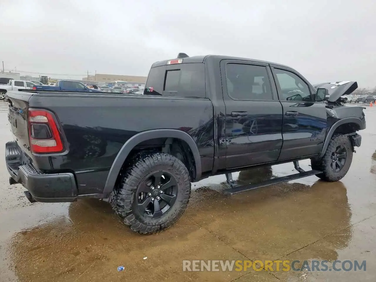 3 Photograph of a damaged car 1C6SRFLT1LN168719 RAM 1500 2020
