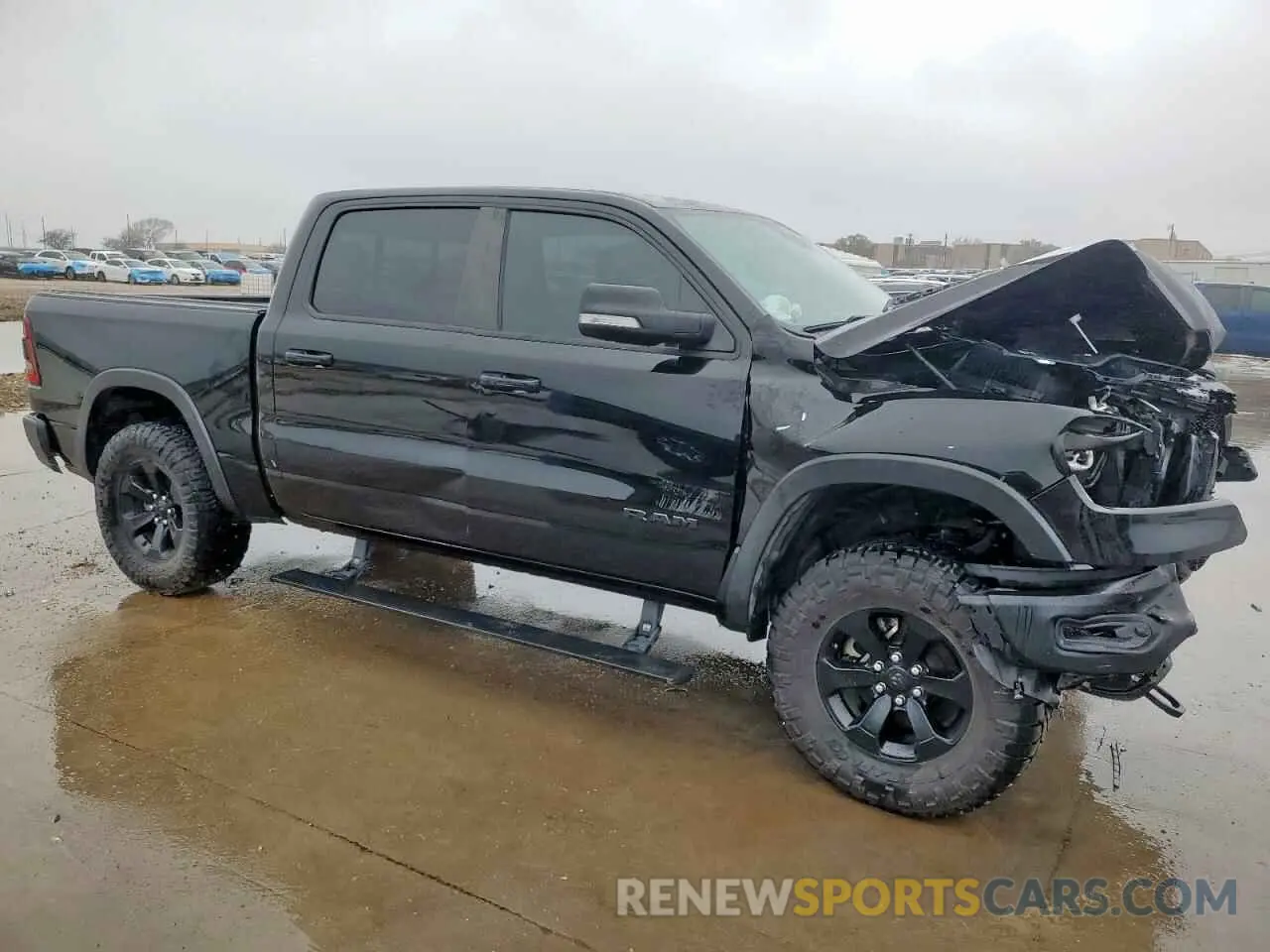 4 Photograph of a damaged car 1C6SRFLT1LN168719 RAM 1500 2020