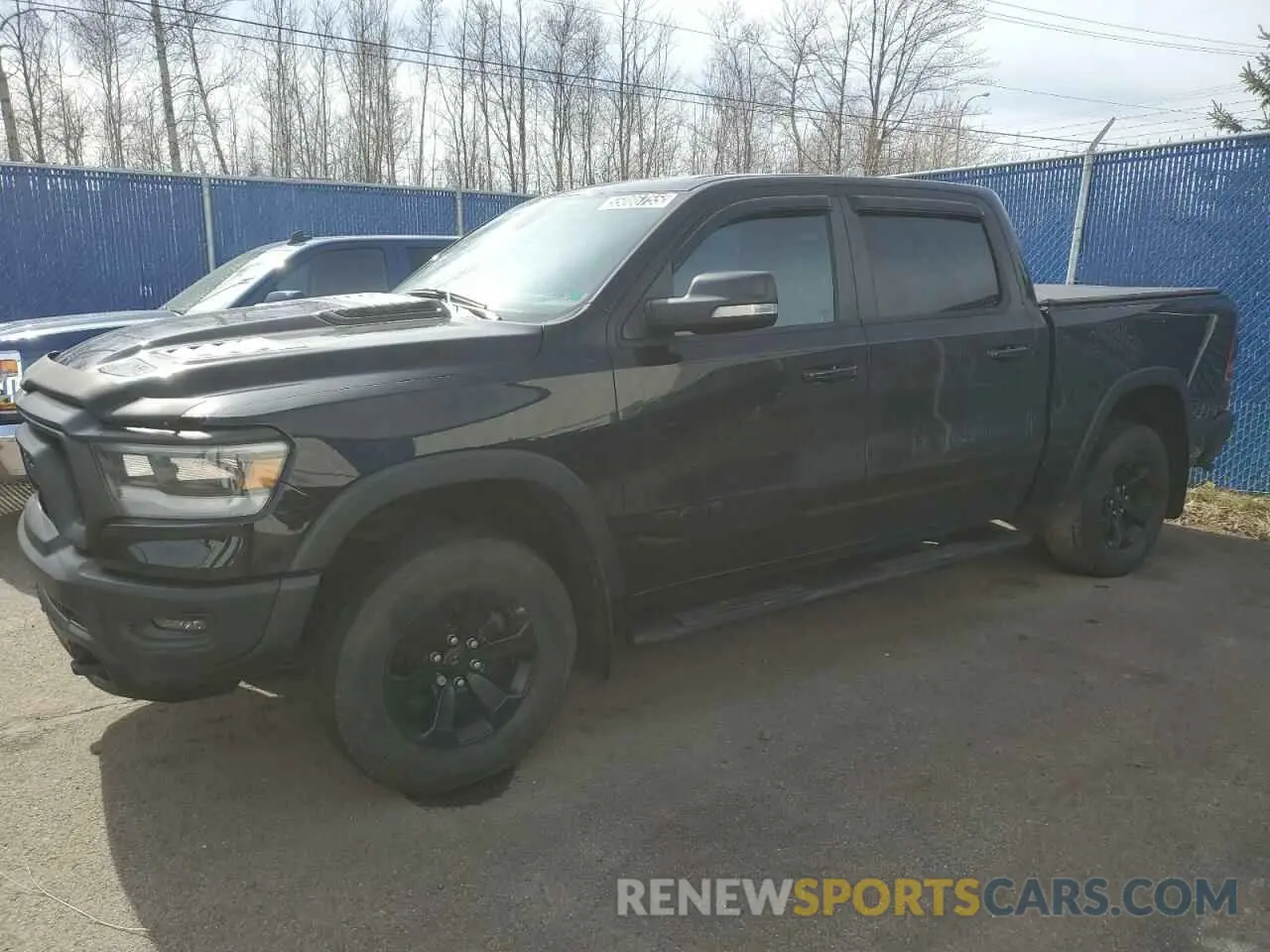1 Photograph of a damaged car 1C6SRFLT1LN205834 RAM 1500 2020