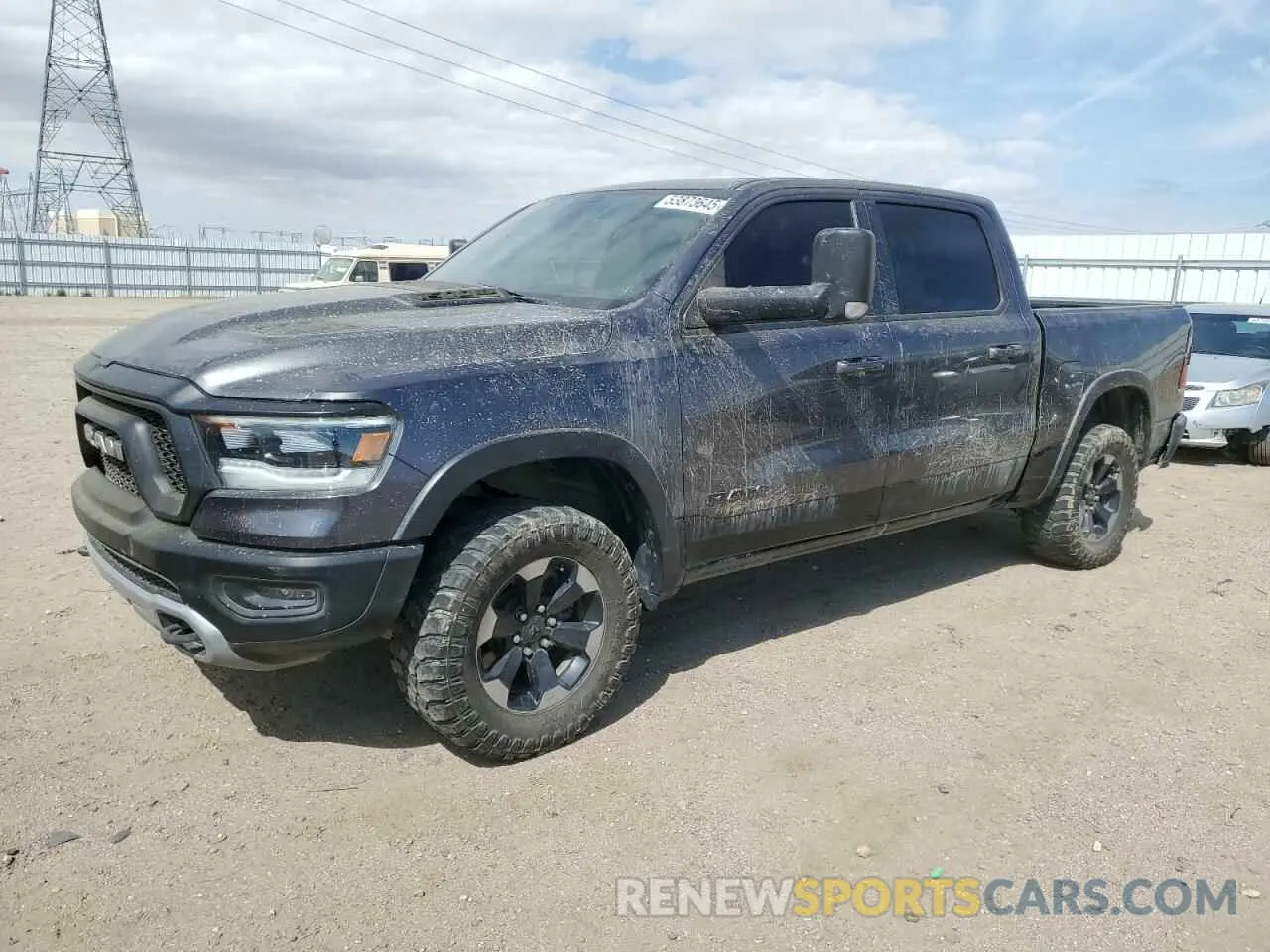 1 Photograph of a damaged car 1C6SRFLT1LN214727 RAM 1500 2020