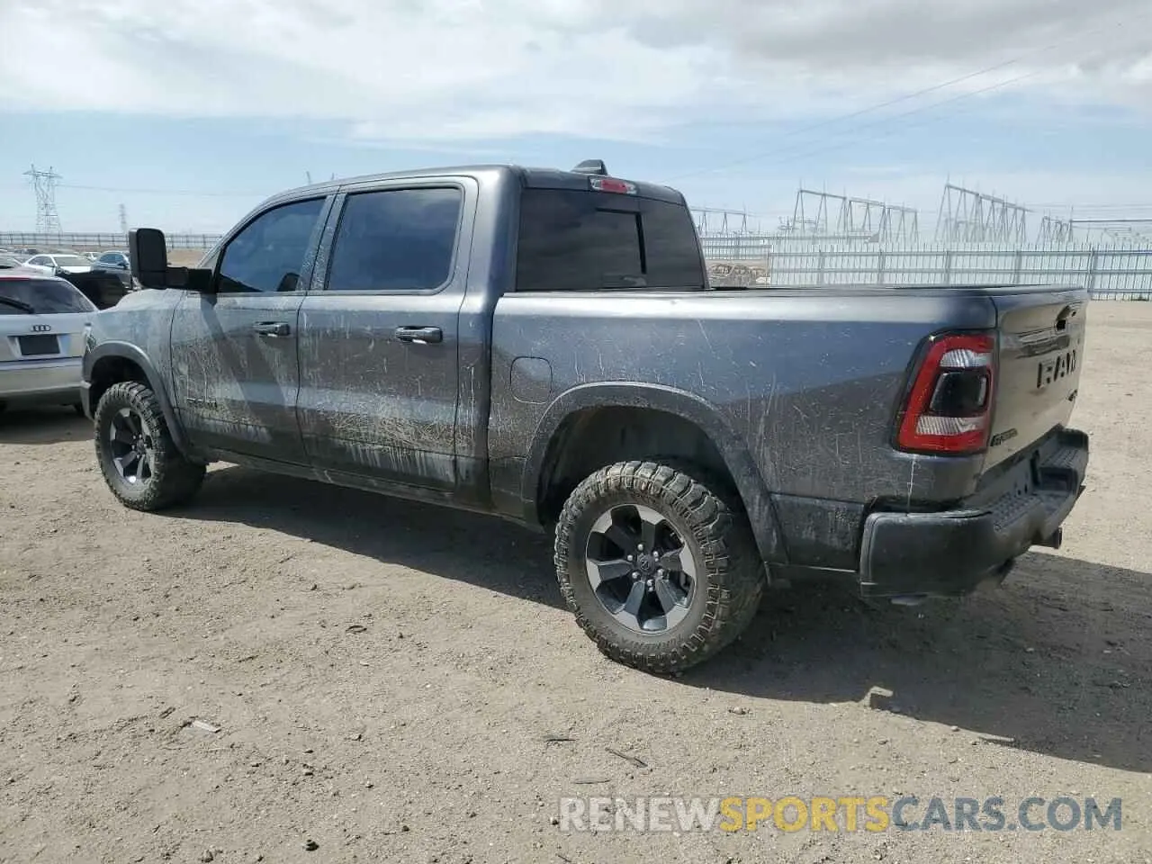 2 Photograph of a damaged car 1C6SRFLT1LN214727 RAM 1500 2020