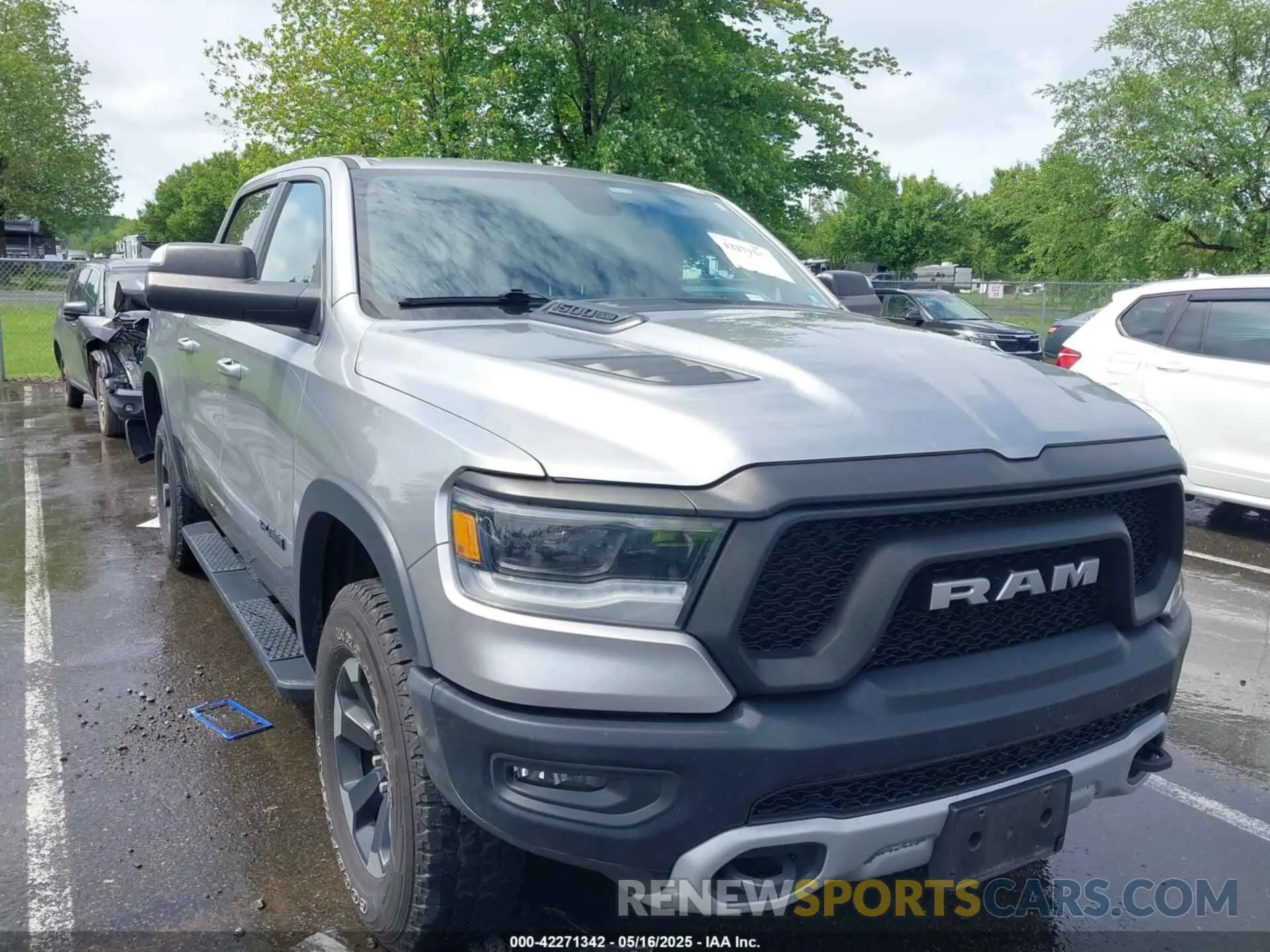1 Photograph of a damaged car 1C6SRFLT1LN279335 RAM 1500 2020