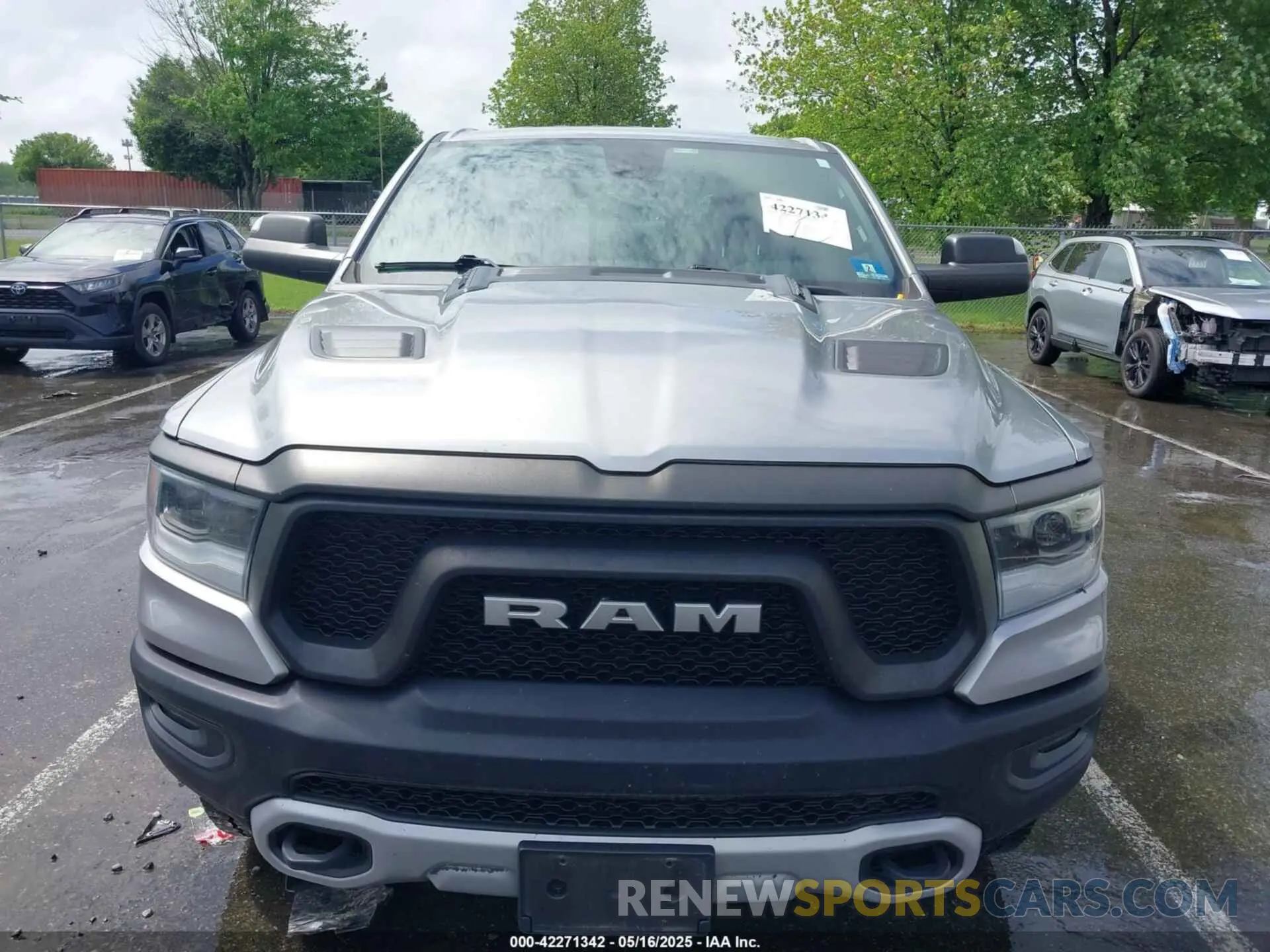 12 Photograph of a damaged car 1C6SRFLT1LN279335 RAM 1500 2020