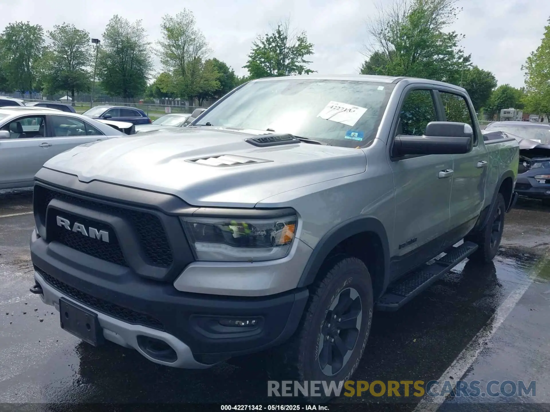 2 Photograph of a damaged car 1C6SRFLT1LN279335 RAM 1500 2020