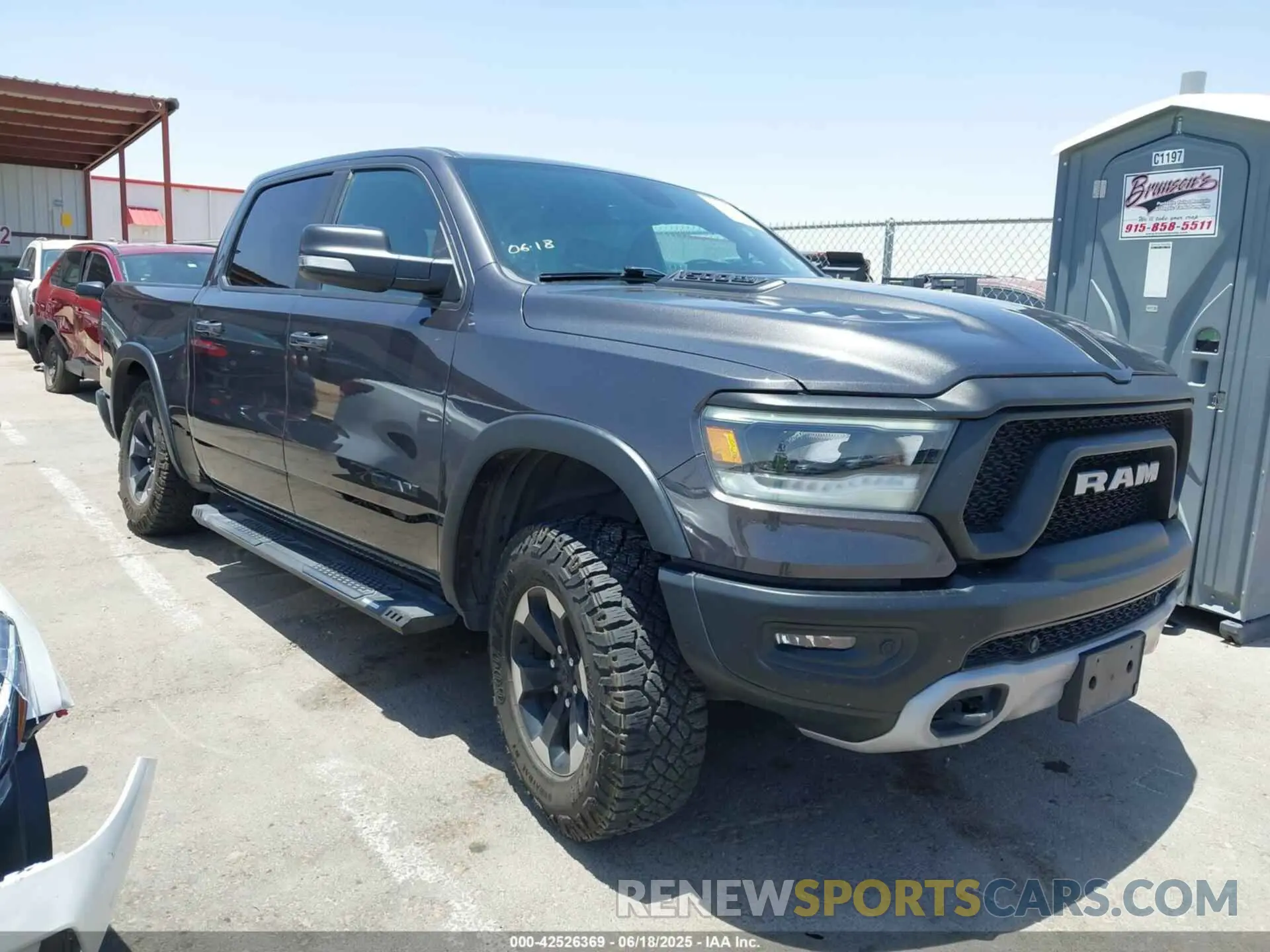 1 Photograph of a damaged car 1C6SRFLT1LN398728 RAM 1500 2020