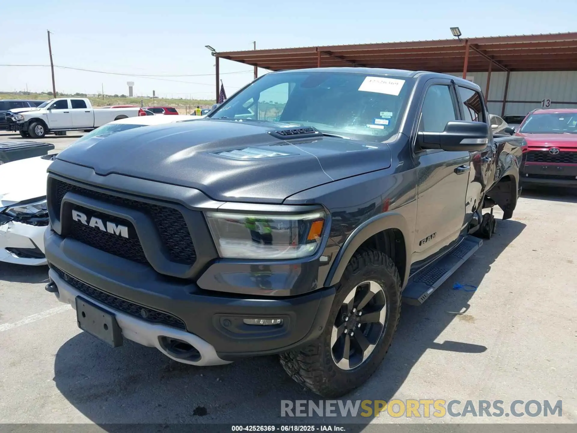 2 Photograph of a damaged car 1C6SRFLT1LN398728 RAM 1500 2020