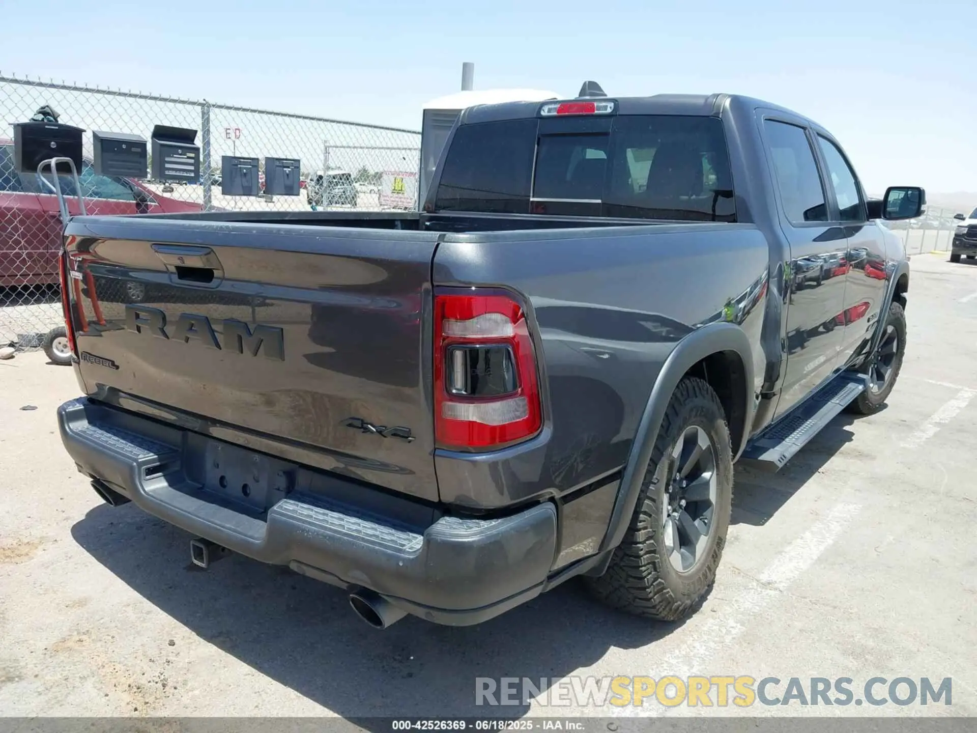 4 Photograph of a damaged car 1C6SRFLT1LN398728 RAM 1500 2020