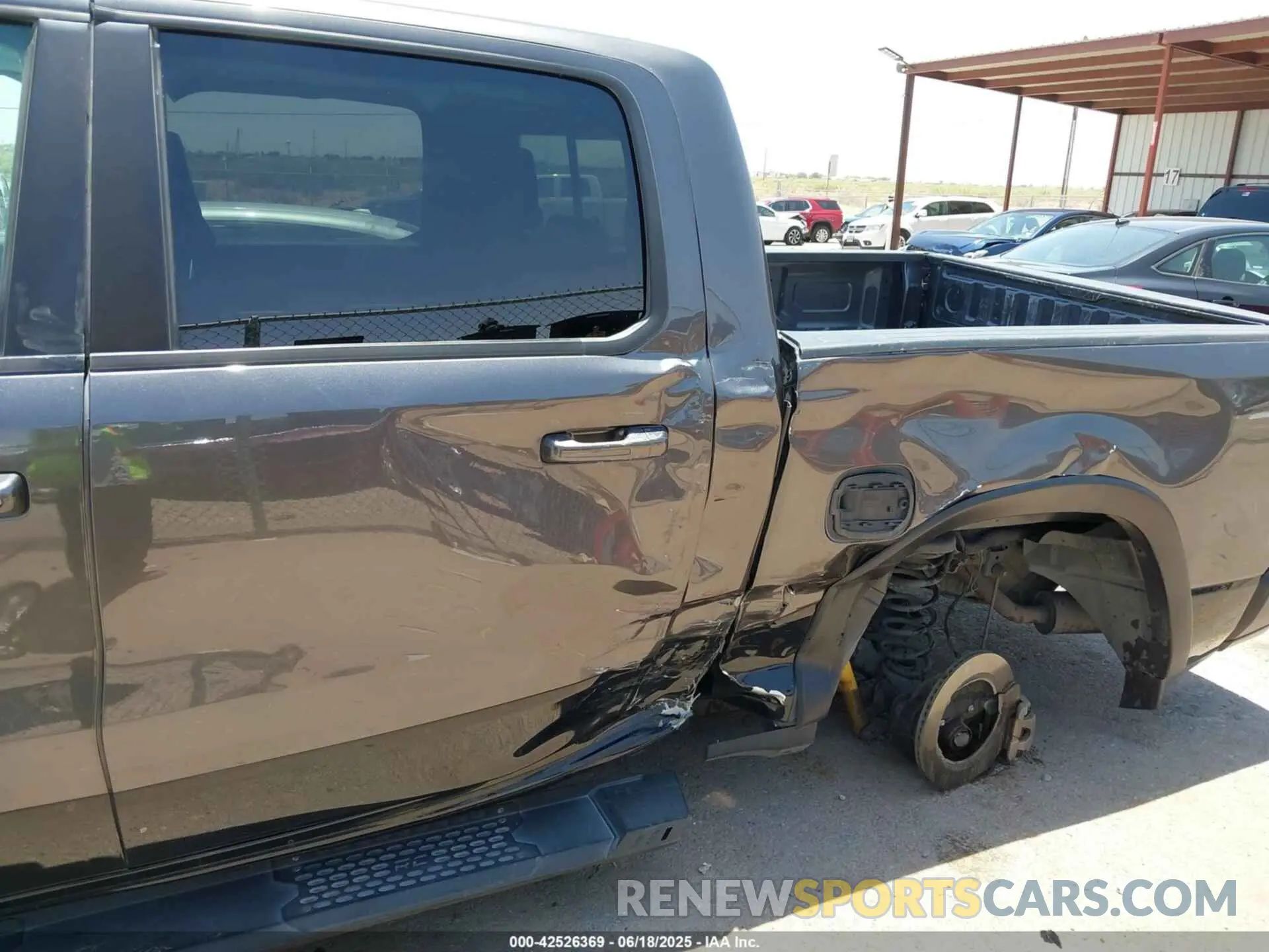 6 Photograph of a damaged car 1C6SRFLT1LN398728 RAM 1500 2020