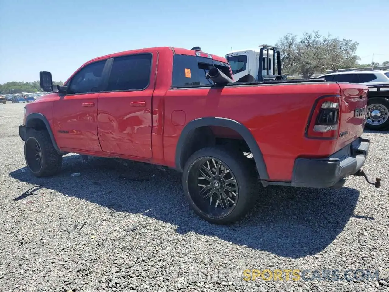 2 Photograph of a damaged car 1C6SRFLT2LN329658 RAM 1500 2020