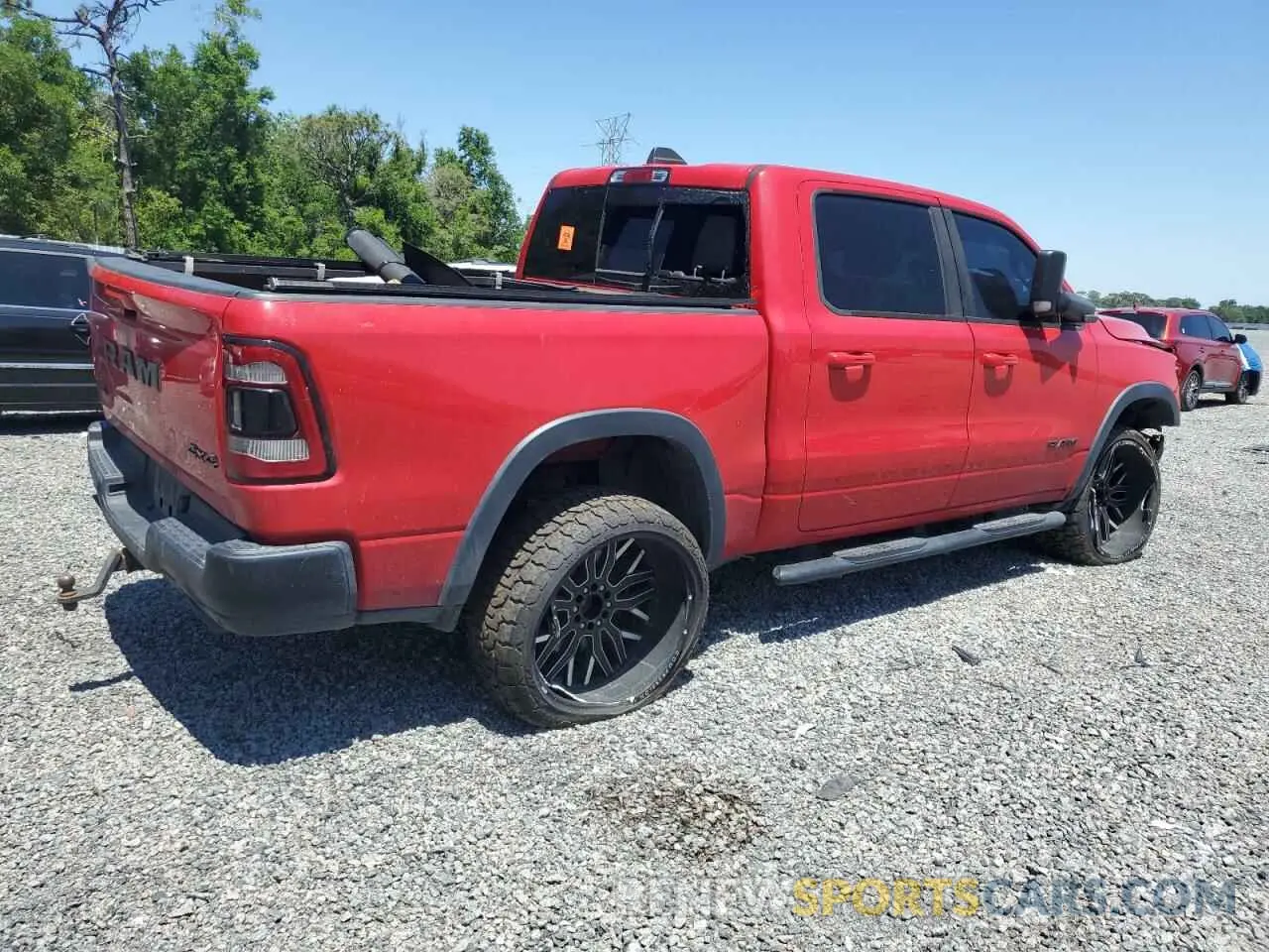 3 Photograph of a damaged car 1C6SRFLT2LN329658 RAM 1500 2020