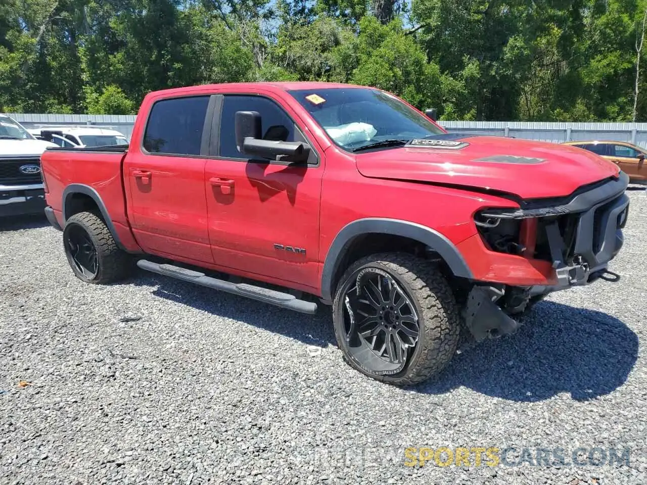 4 Photograph of a damaged car 1C6SRFLT2LN329658 RAM 1500 2020
