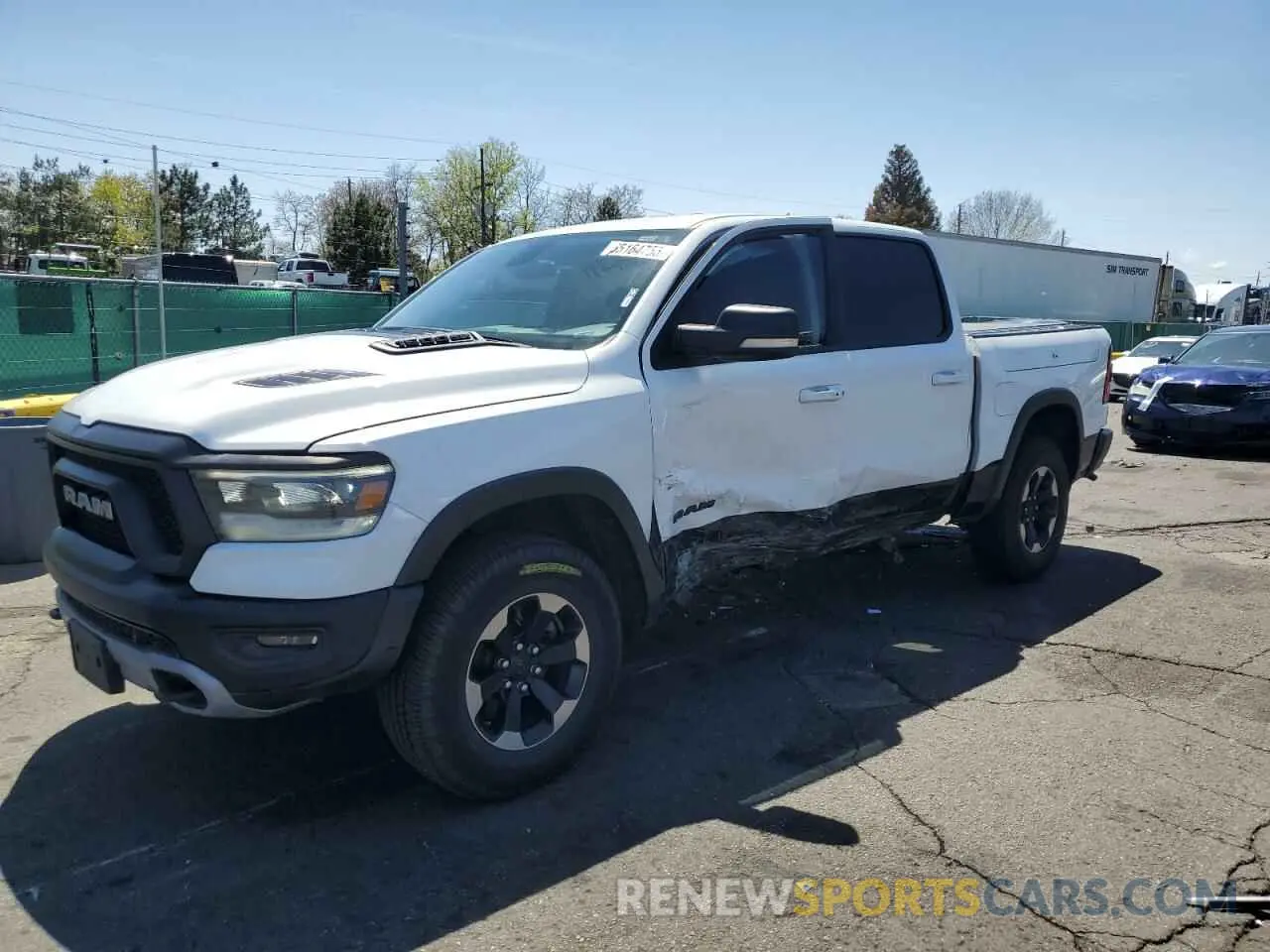 1 Photograph of a damaged car 1C6SRFLT2LN360456 RAM 1500 2020