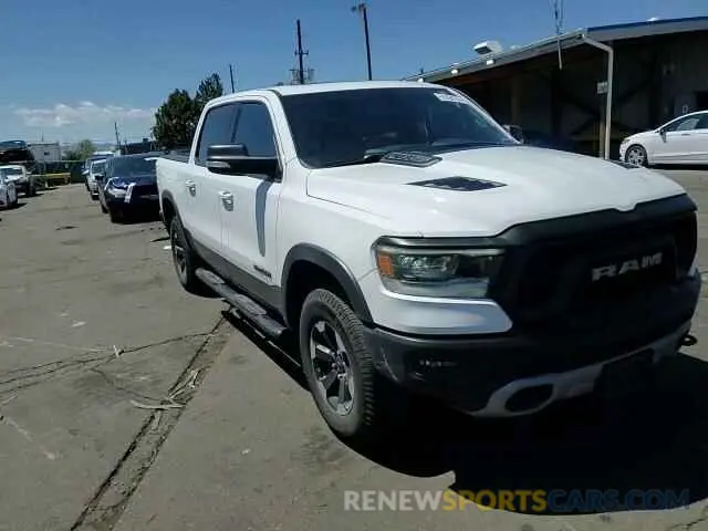 13 Photograph of a damaged car 1C6SRFLT2LN360456 RAM 1500 2020