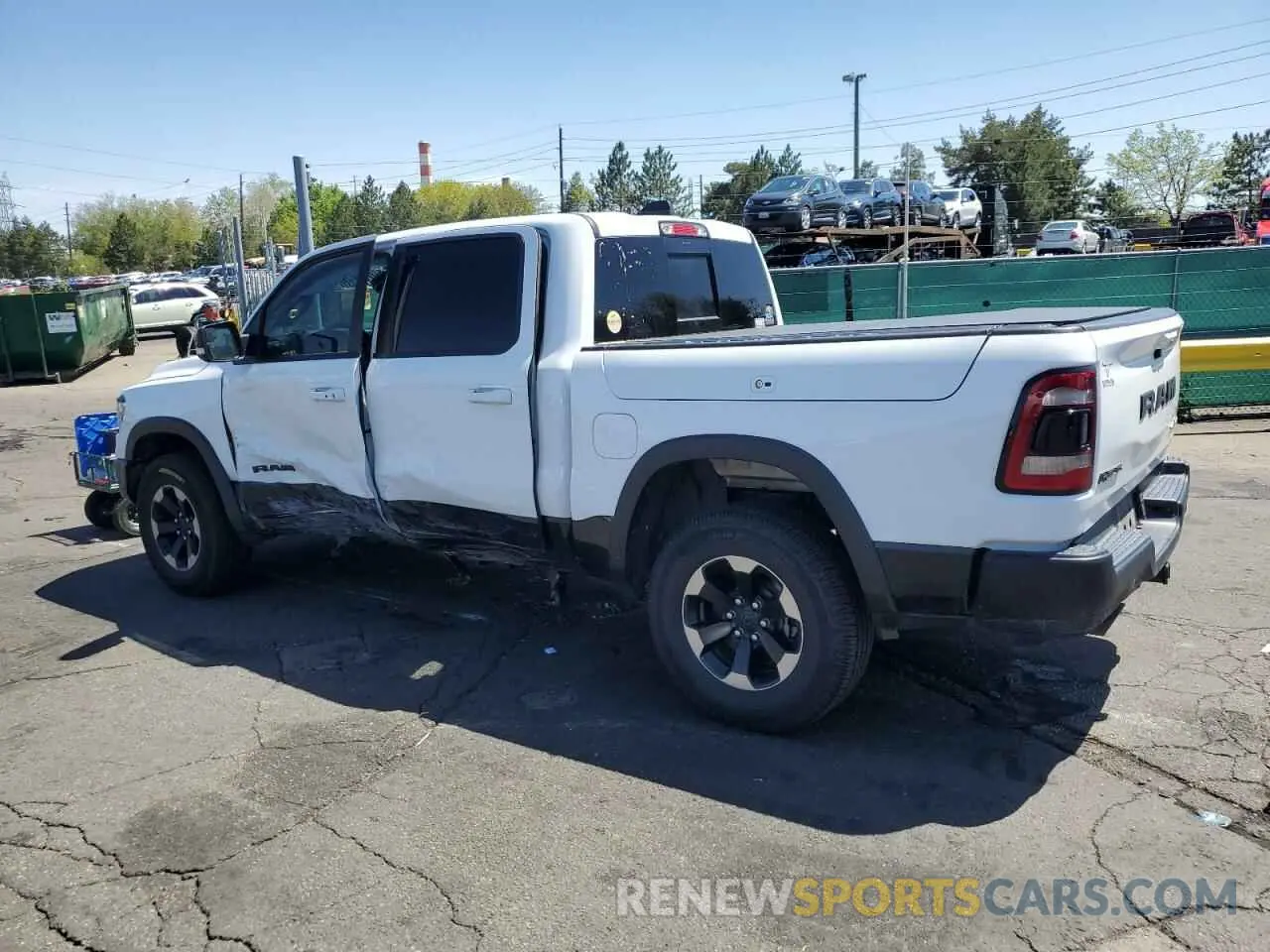 2 Photograph of a damaged car 1C6SRFLT2LN360456 RAM 1500 2020