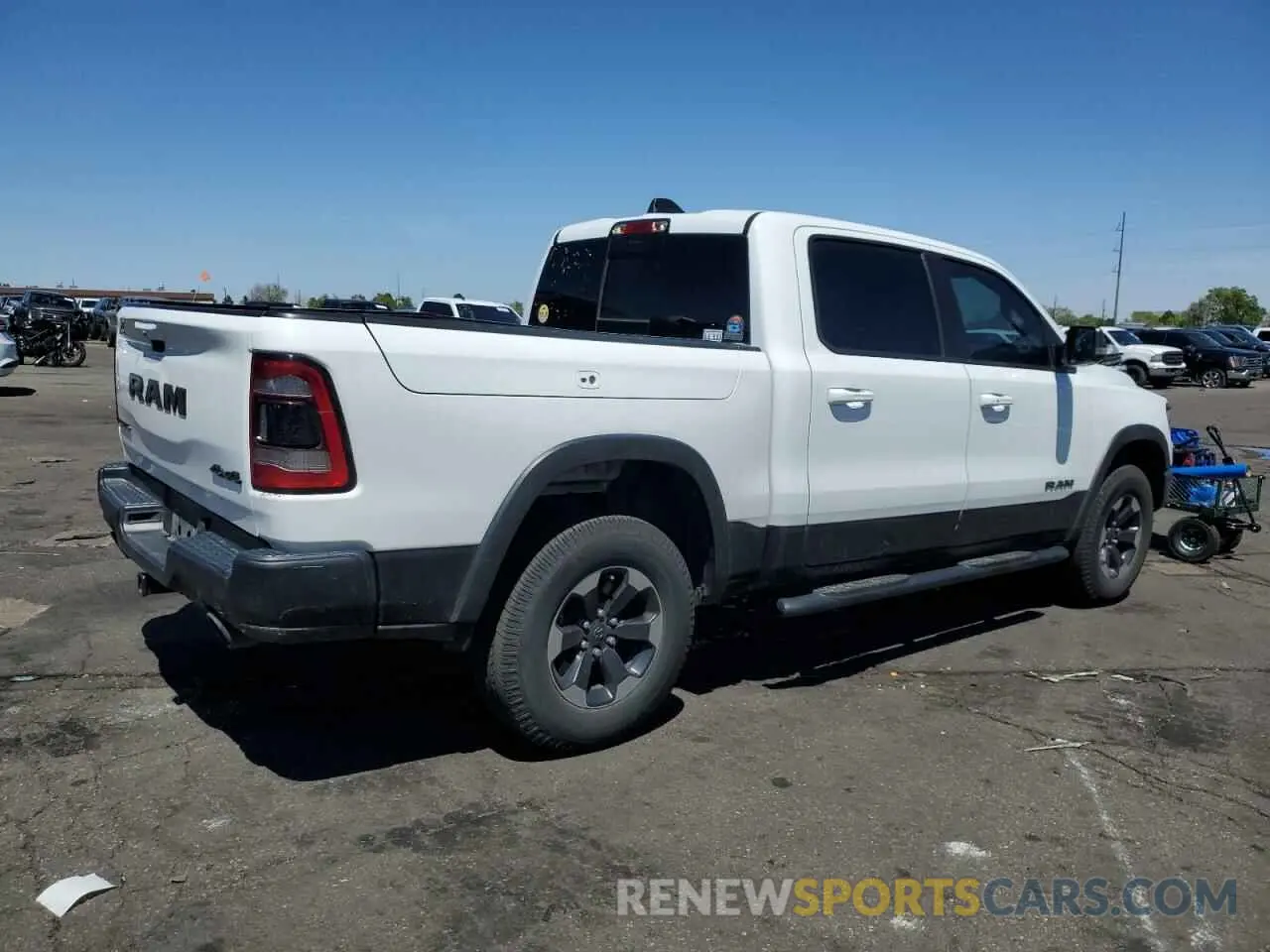 3 Photograph of a damaged car 1C6SRFLT2LN360456 RAM 1500 2020