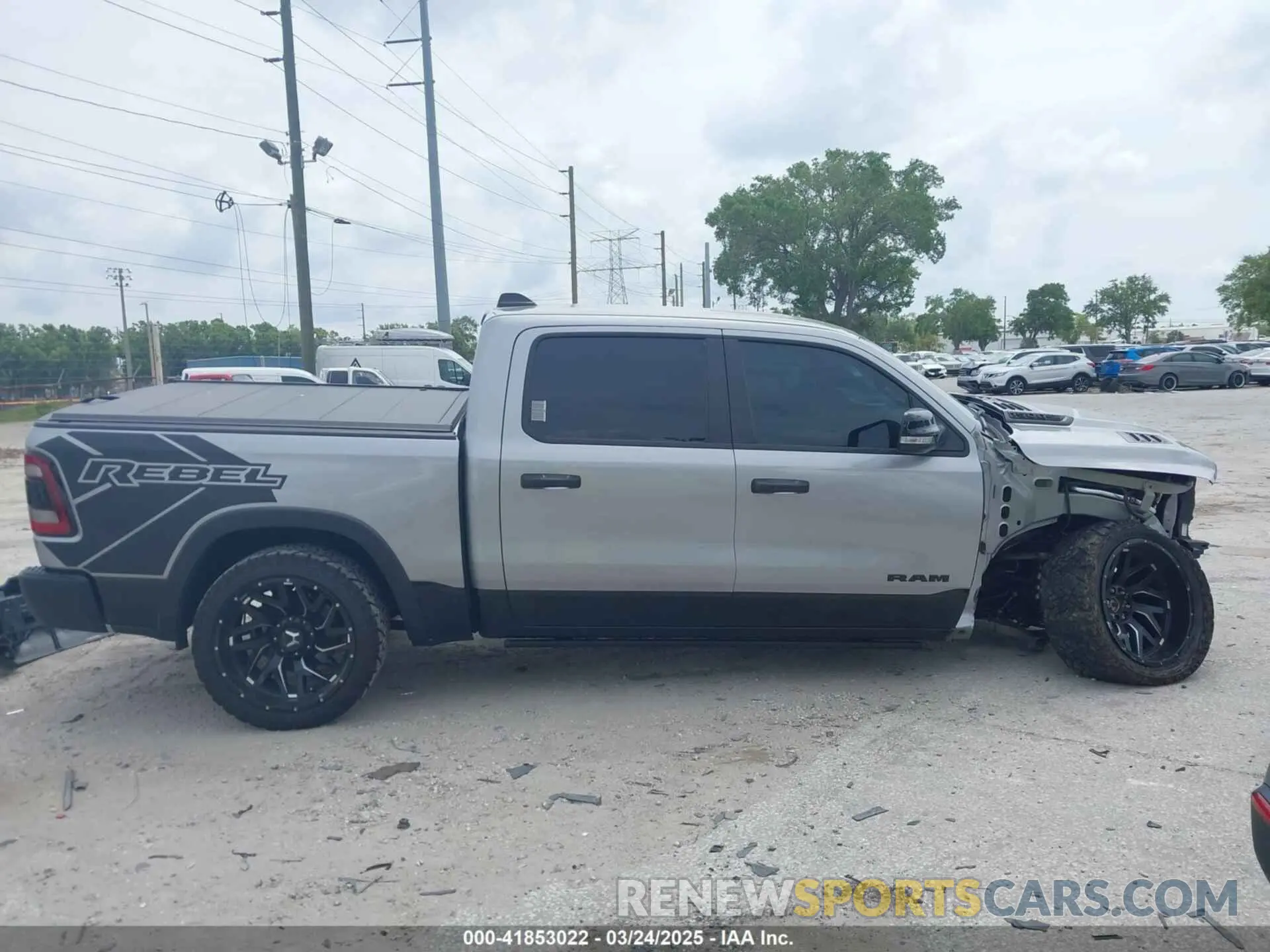 14 Photograph of a damaged car 1C6SRFLT3LN142719 RAM 1500 2020