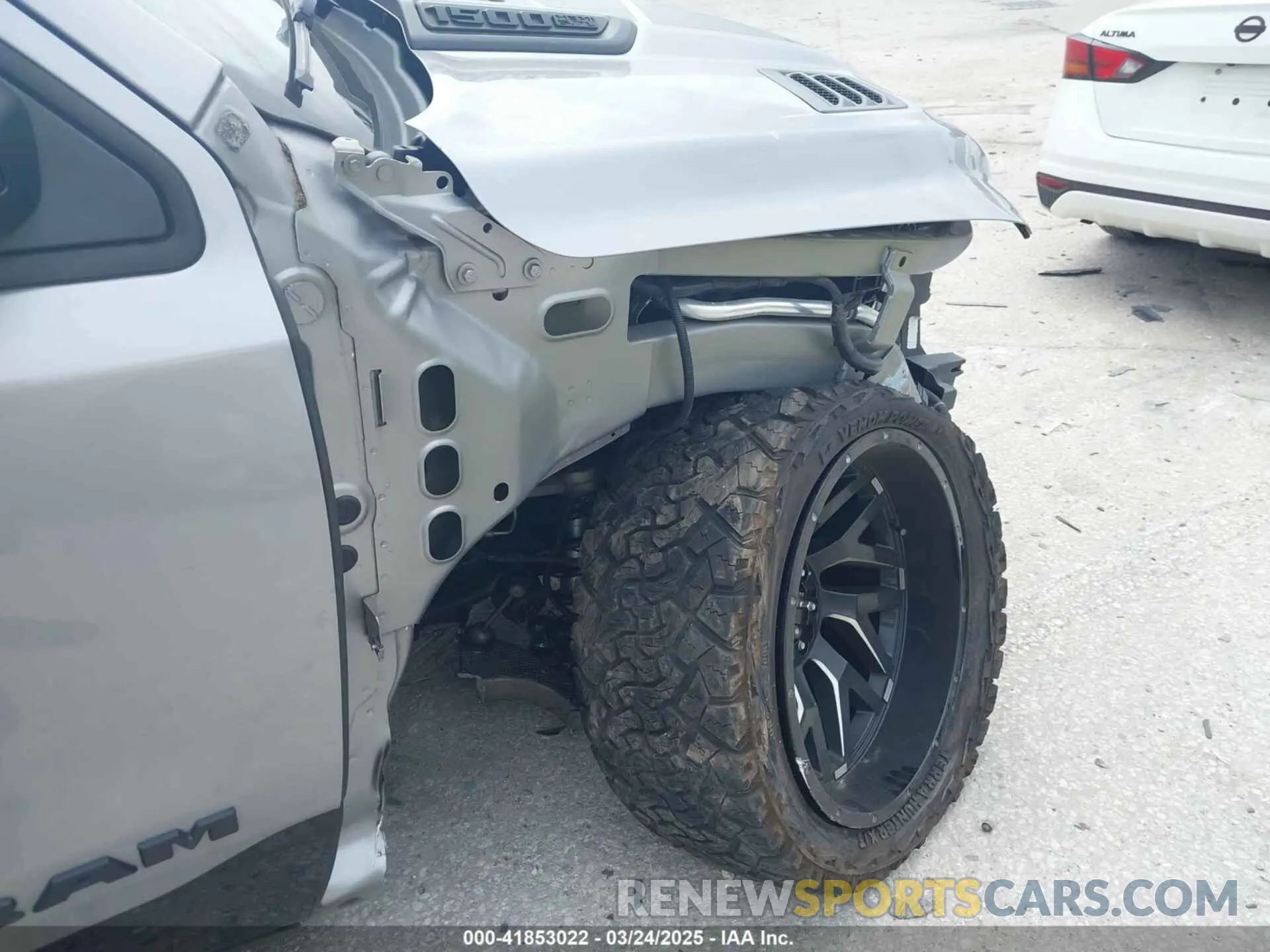 18 Photograph of a damaged car 1C6SRFLT3LN142719 RAM 1500 2020
