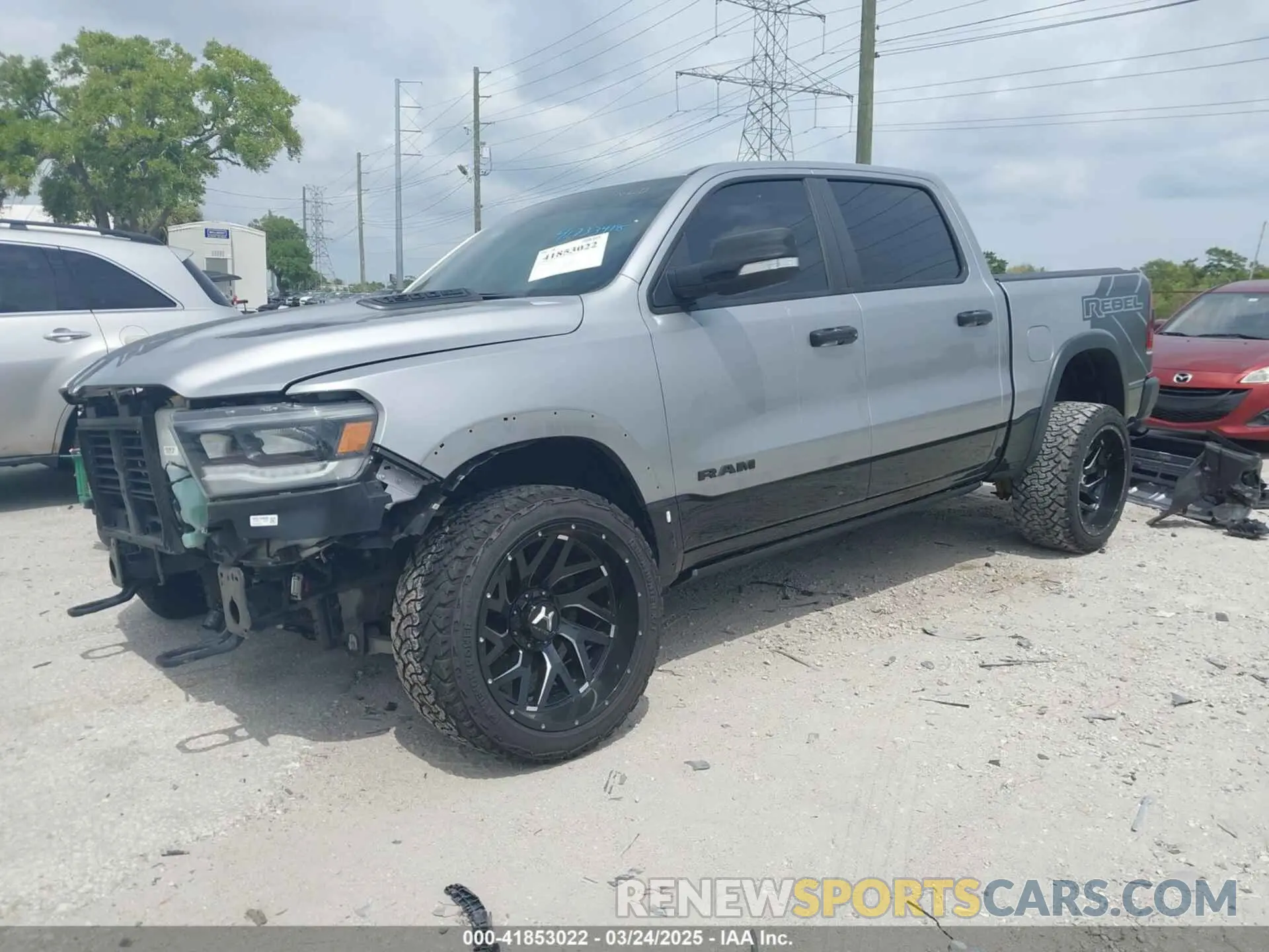 2 Photograph of a damaged car 1C6SRFLT3LN142719 RAM 1500 2020