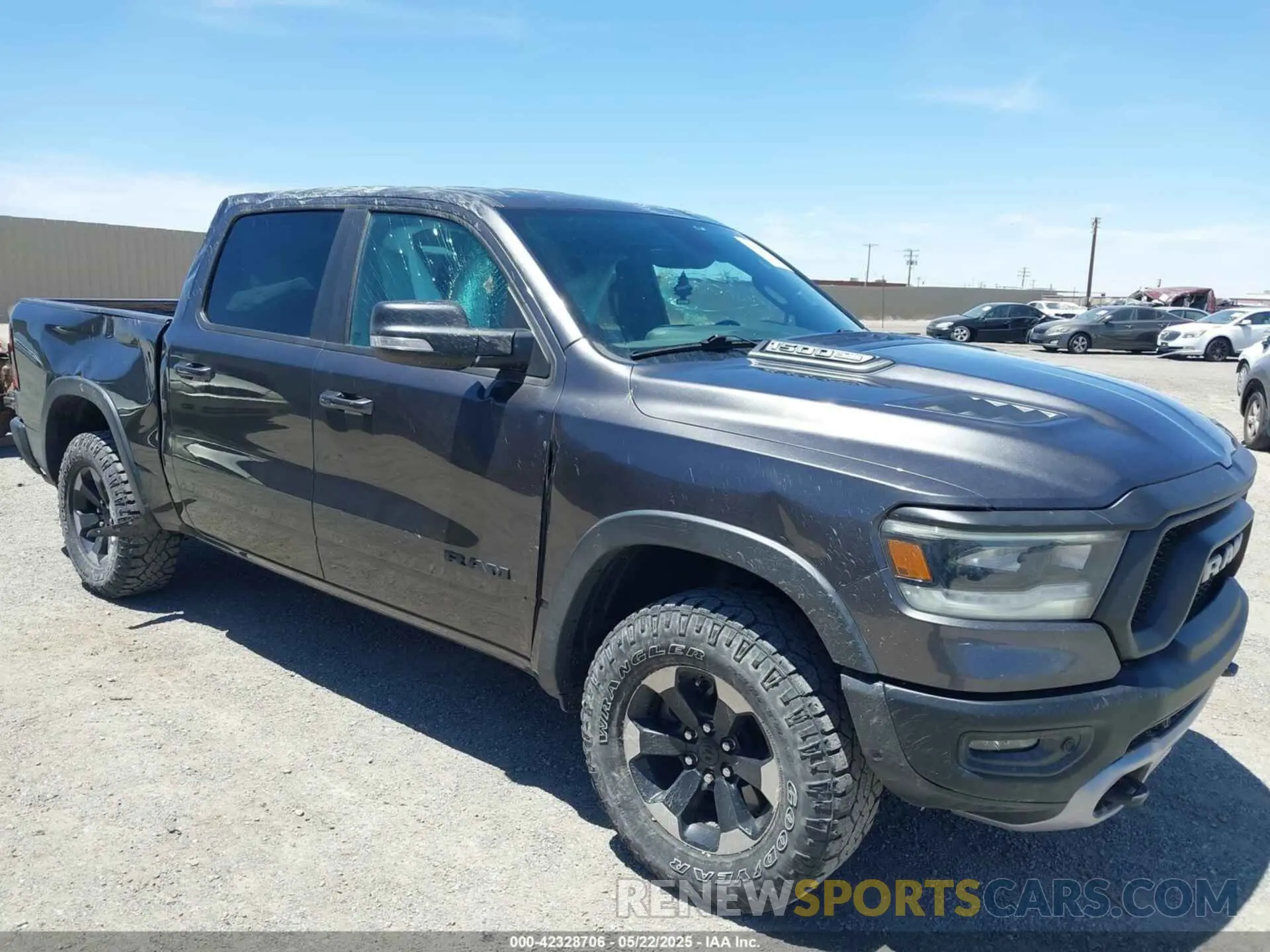 1 Photograph of a damaged car 1C6SRFLT4LN216035 RAM 1500 2020