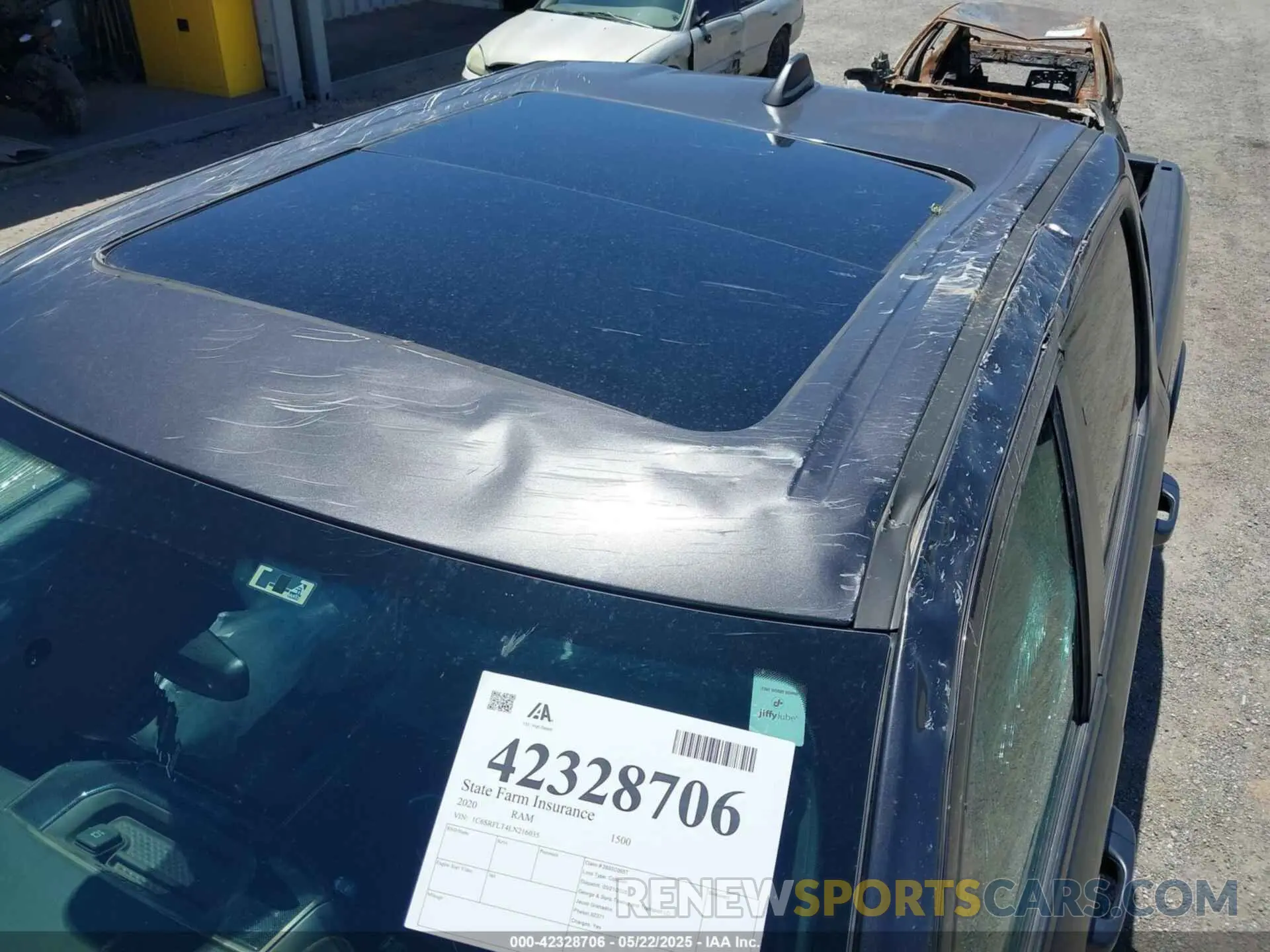 12 Photograph of a damaged car 1C6SRFLT4LN216035 RAM 1500 2020