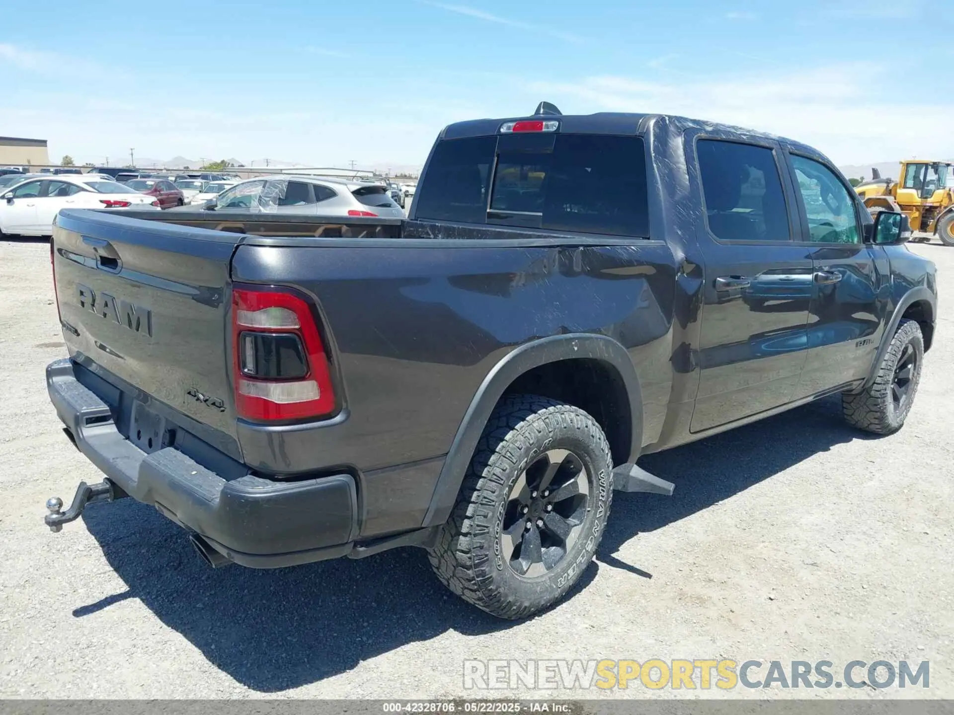 4 Photograph of a damaged car 1C6SRFLT4LN216035 RAM 1500 2020