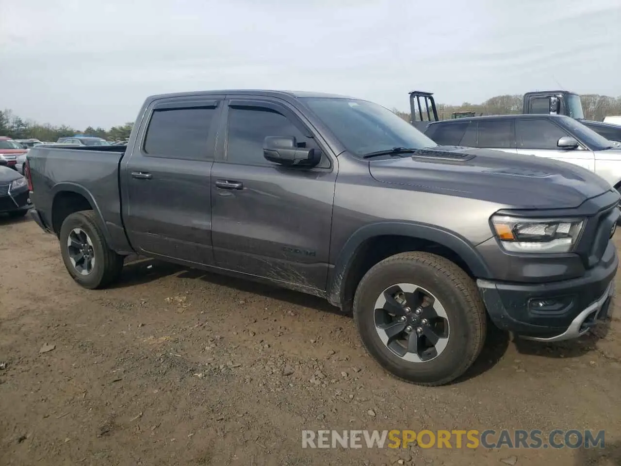 4 Photograph of a damaged car 1C6SRFLT5LN154225 RAM 1500 2020