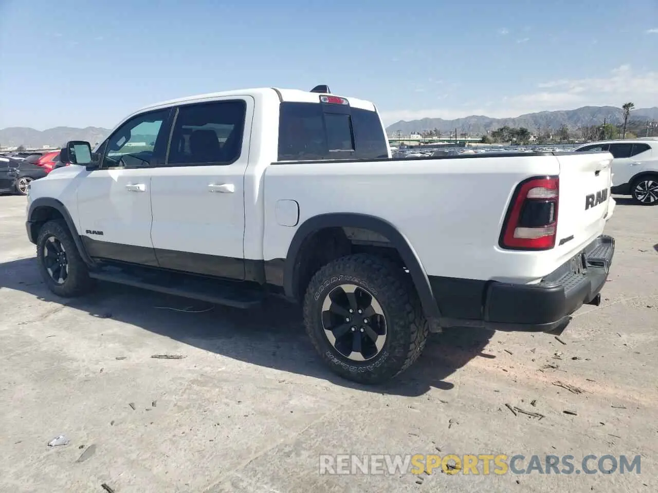 2 Photograph of a damaged car 1C6SRFLT5LN199097 RAM 1500 2020
