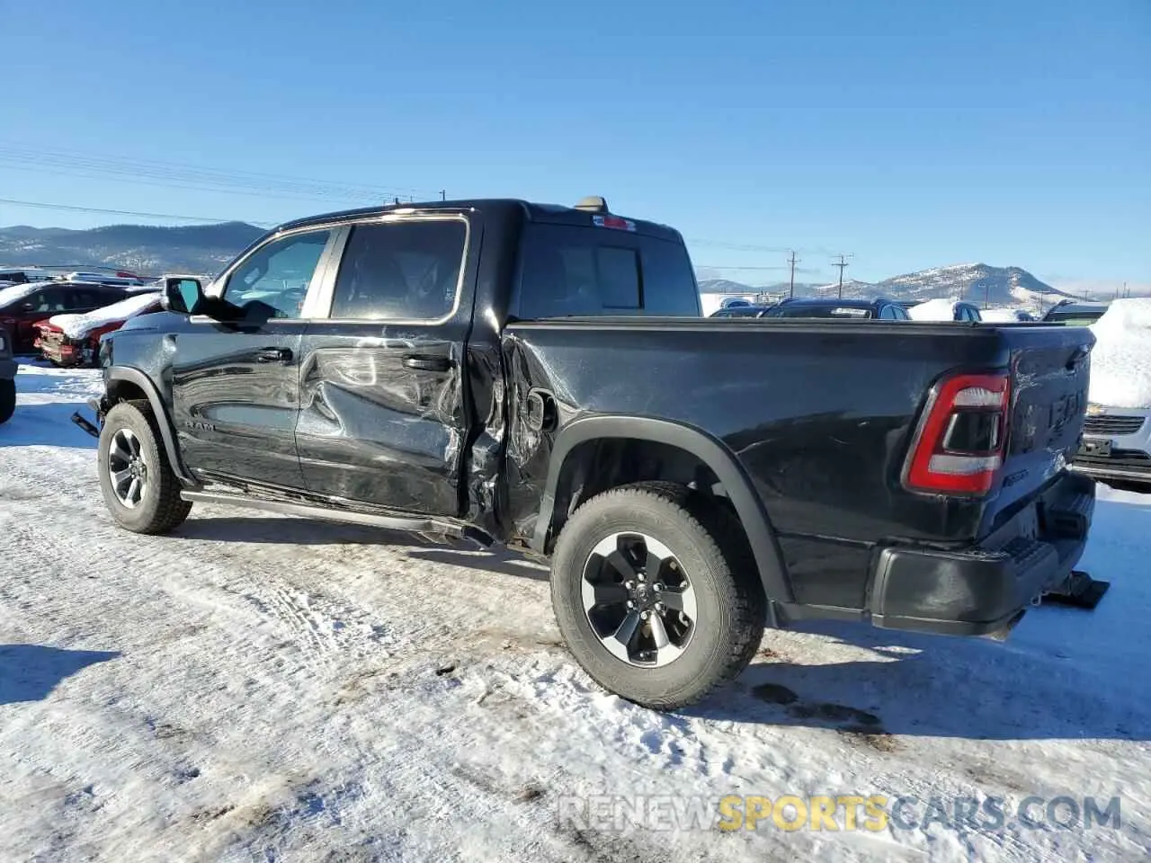 2 Photograph of a damaged car 1C6SRFLT6LN116499 RAM 1500 2020