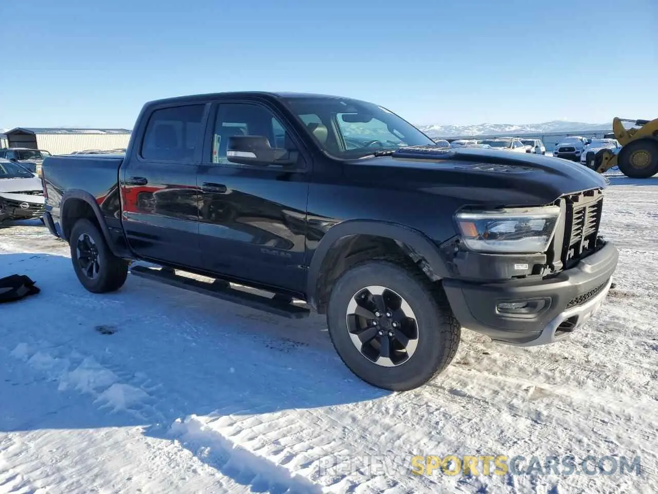 4 Photograph of a damaged car 1C6SRFLT6LN116499 RAM 1500 2020