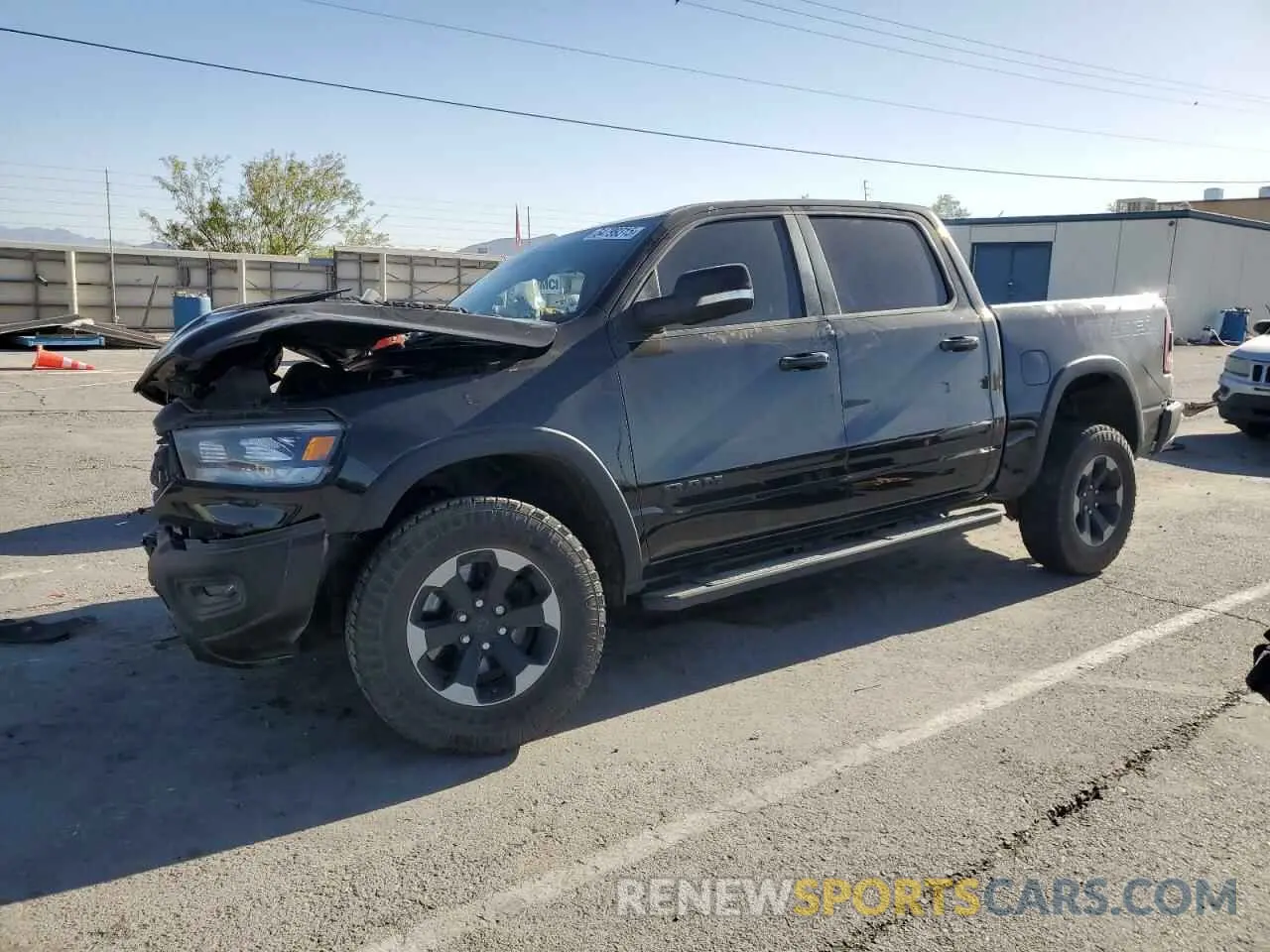 1 Photograph of a damaged car 1C6SRFLT6LN141838 RAM 1500 2020