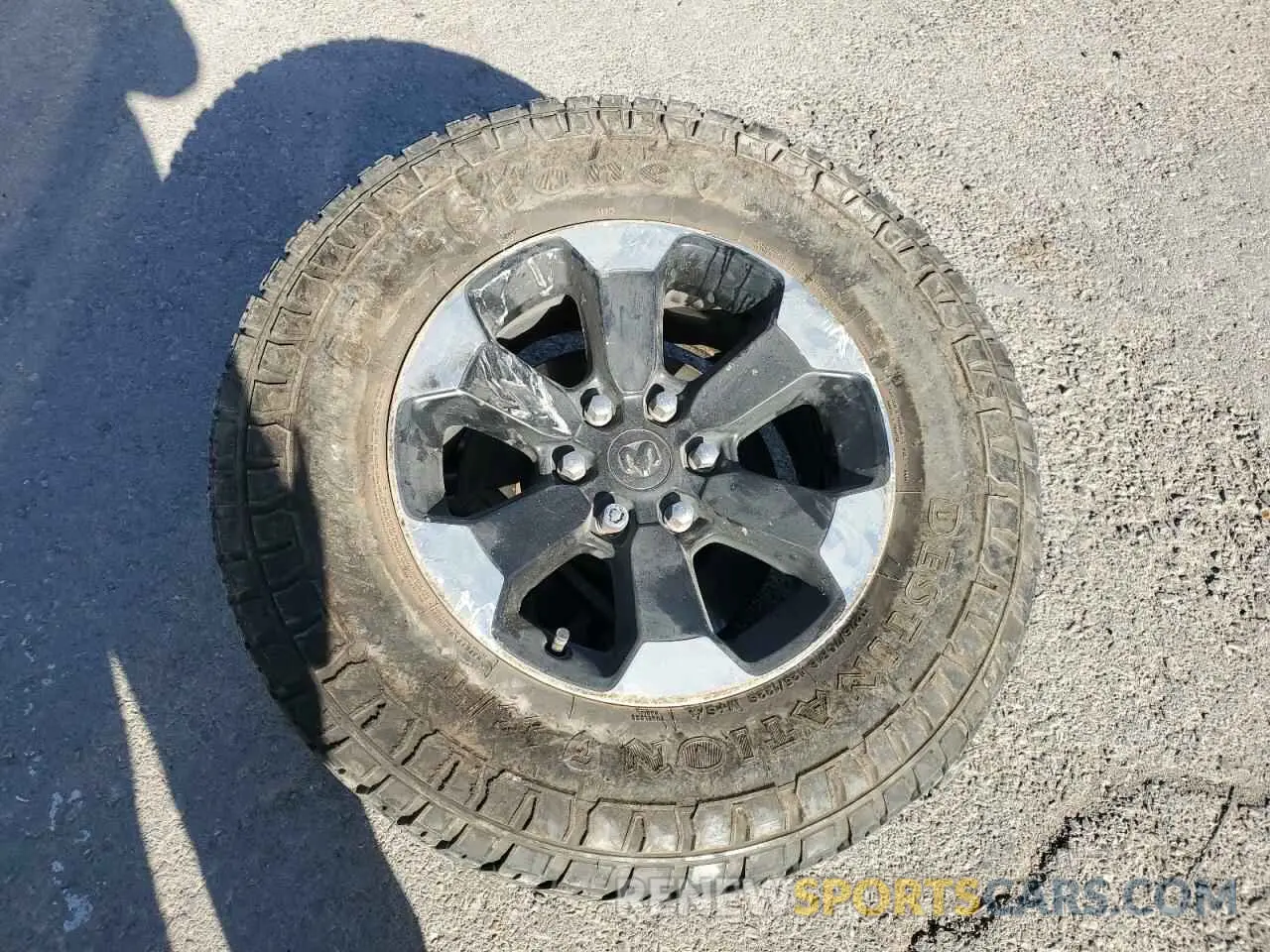 12 Photograph of a damaged car 1C6SRFLT6LN141838 RAM 1500 2020