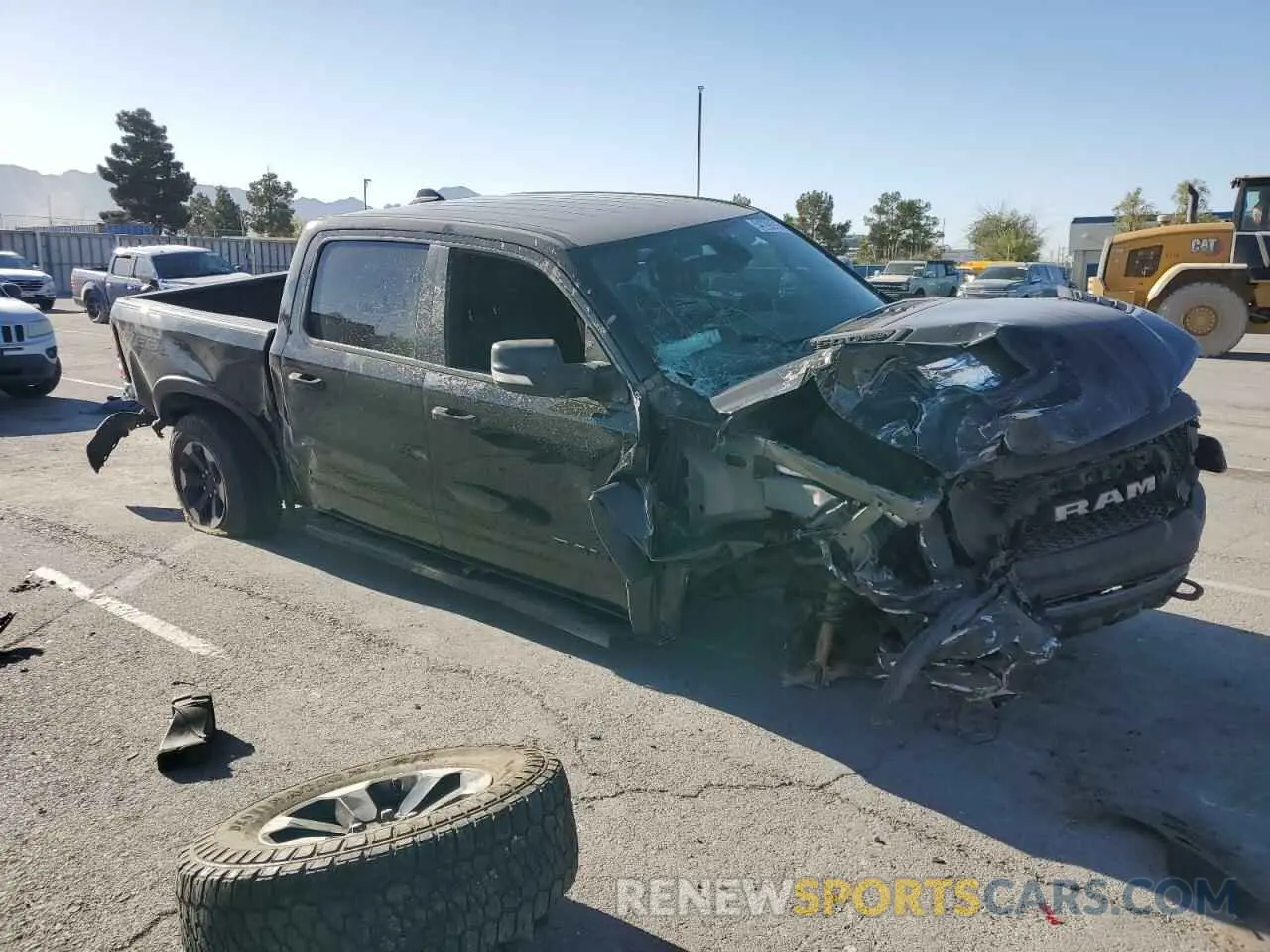 4 Photograph of a damaged car 1C6SRFLT6LN141838 RAM 1500 2020