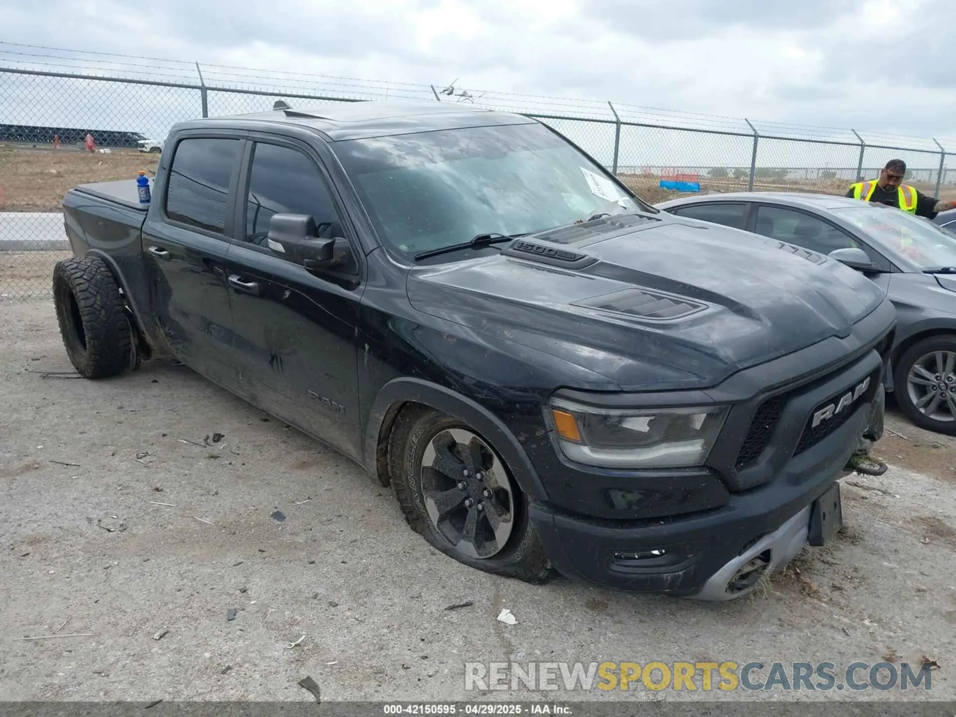 1 Photograph of a damaged car 1C6SRFLT6LN211127 RAM 1500 2020