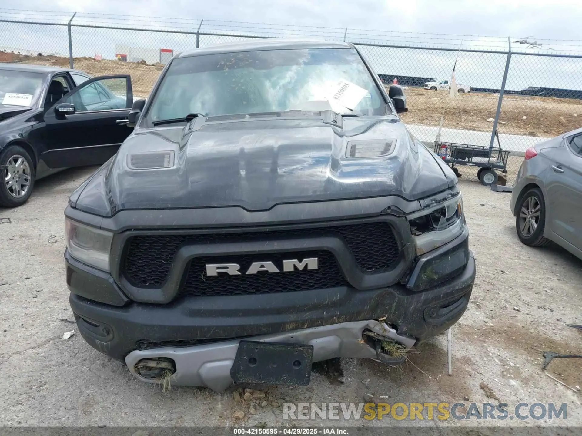 12 Photograph of a damaged car 1C6SRFLT6LN211127 RAM 1500 2020