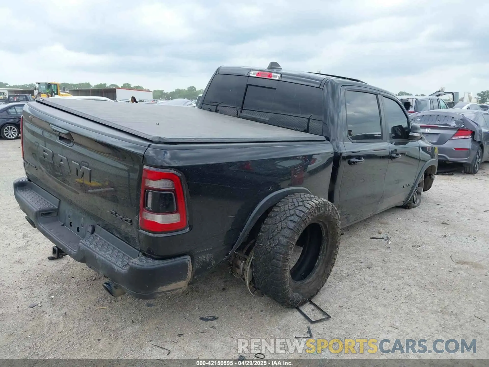 4 Photograph of a damaged car 1C6SRFLT6LN211127 RAM 1500 2020