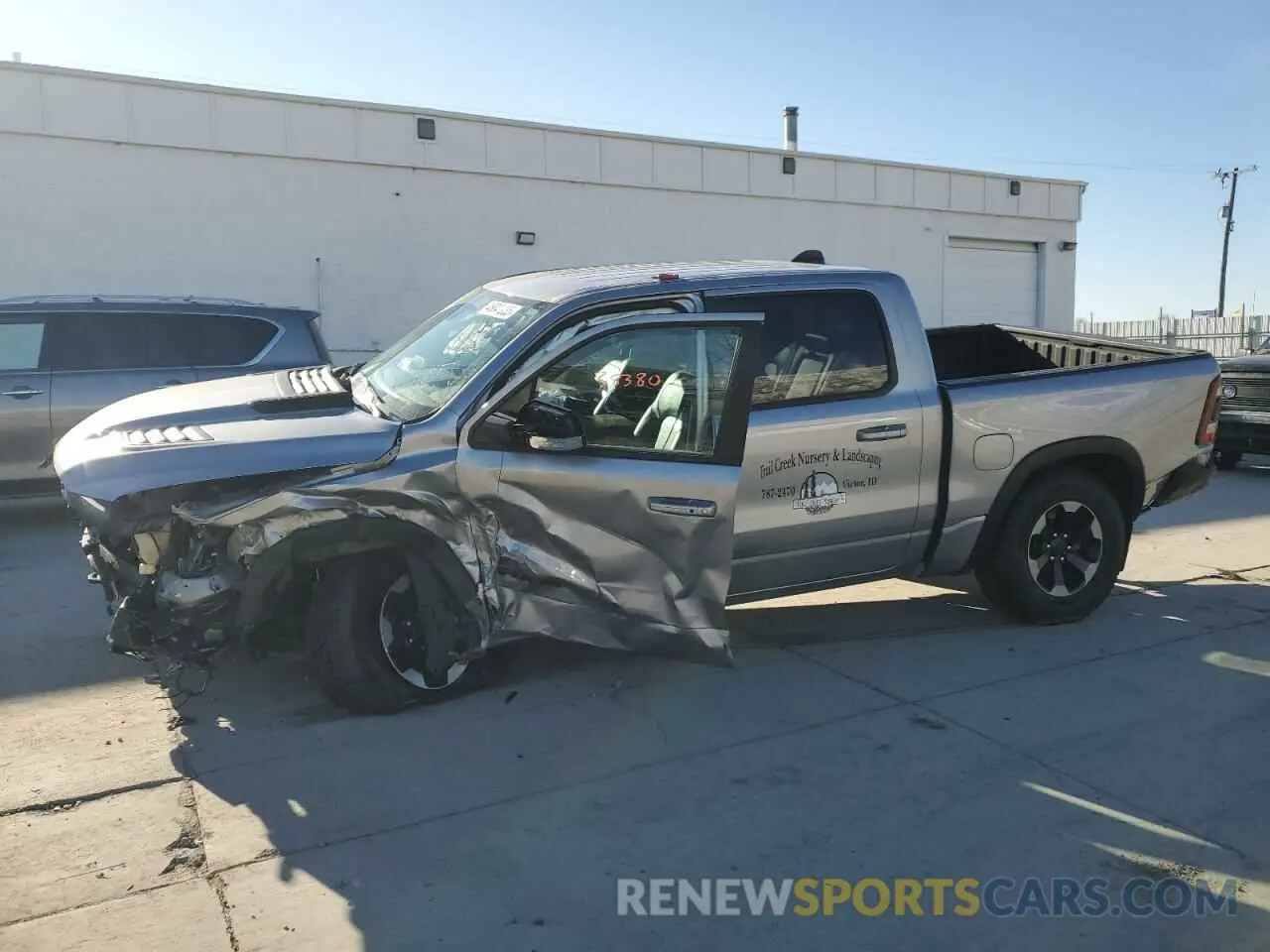 1 Photograph of a damaged car 1C6SRFLT6LN269304 RAM 1500 2020