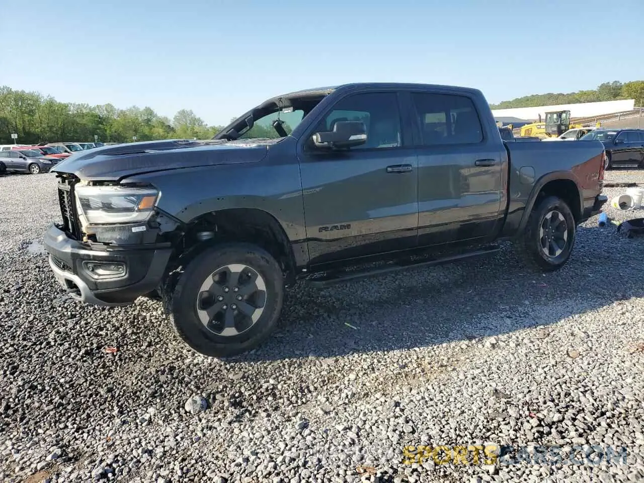 1 Photograph of a damaged car 1C6SRFLT6LN360847 RAM 1500 2020