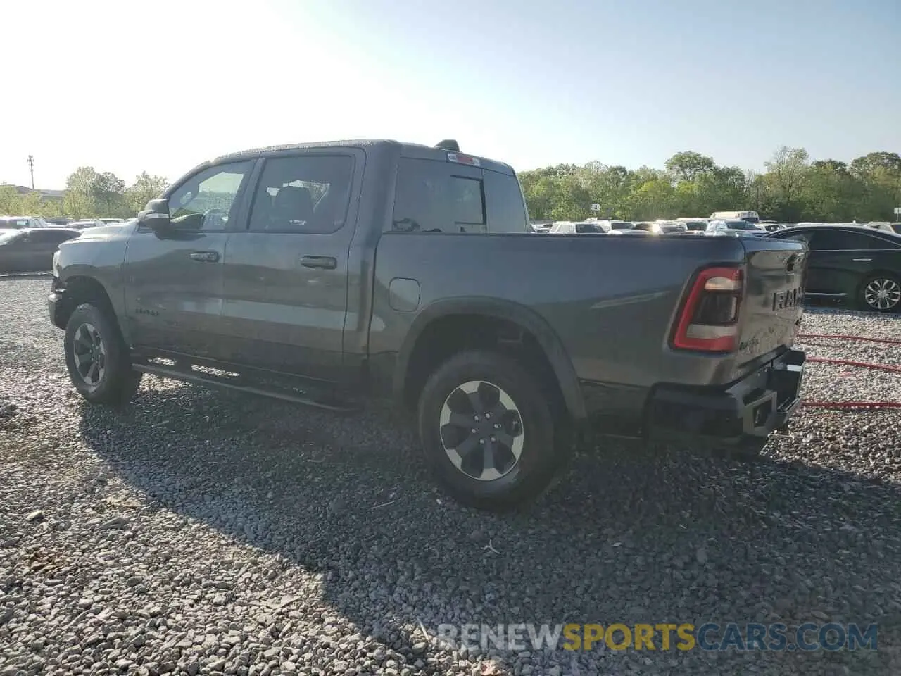 2 Photograph of a damaged car 1C6SRFLT6LN360847 RAM 1500 2020