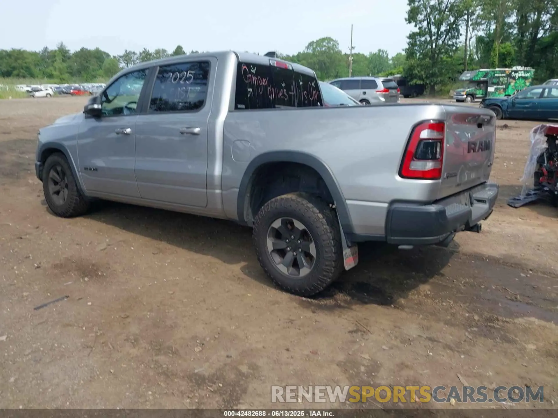 14 Photograph of a damaged car 1C6SRFLT6LN376238 RAM 1500 2020