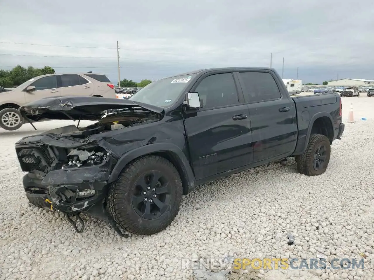 1 Photograph of a damaged car 1C6SRFLT7LN218944 RAM 1500 2020