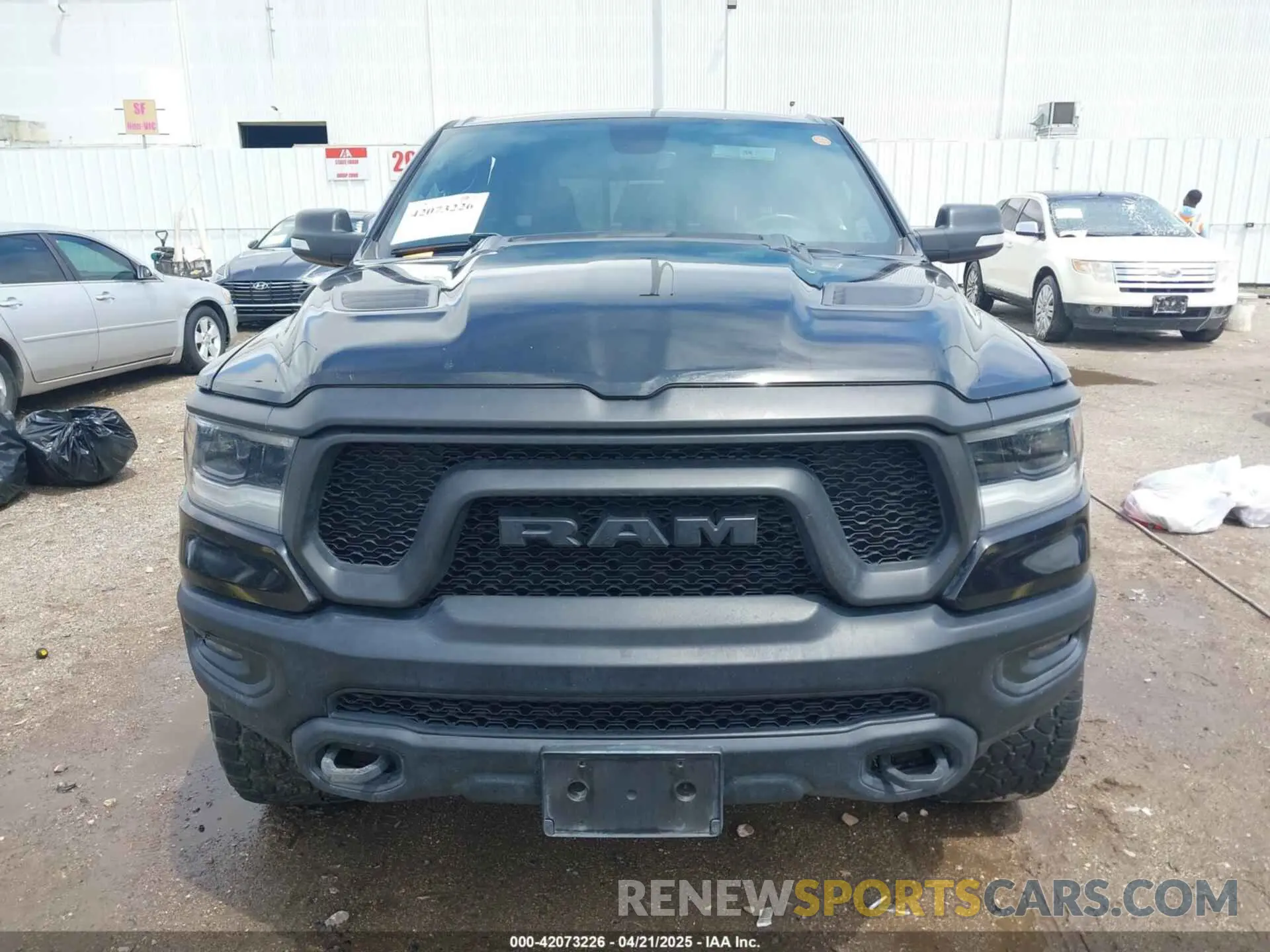 12 Photograph of a damaged car 1C6SRFLT7LN289562 RAM 1500 2020