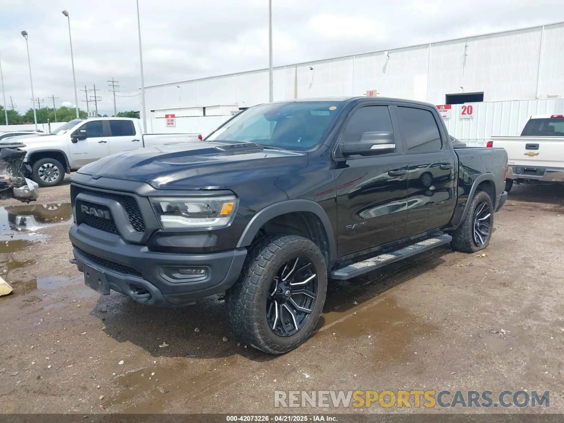 2 Photograph of a damaged car 1C6SRFLT7LN289562 RAM 1500 2020