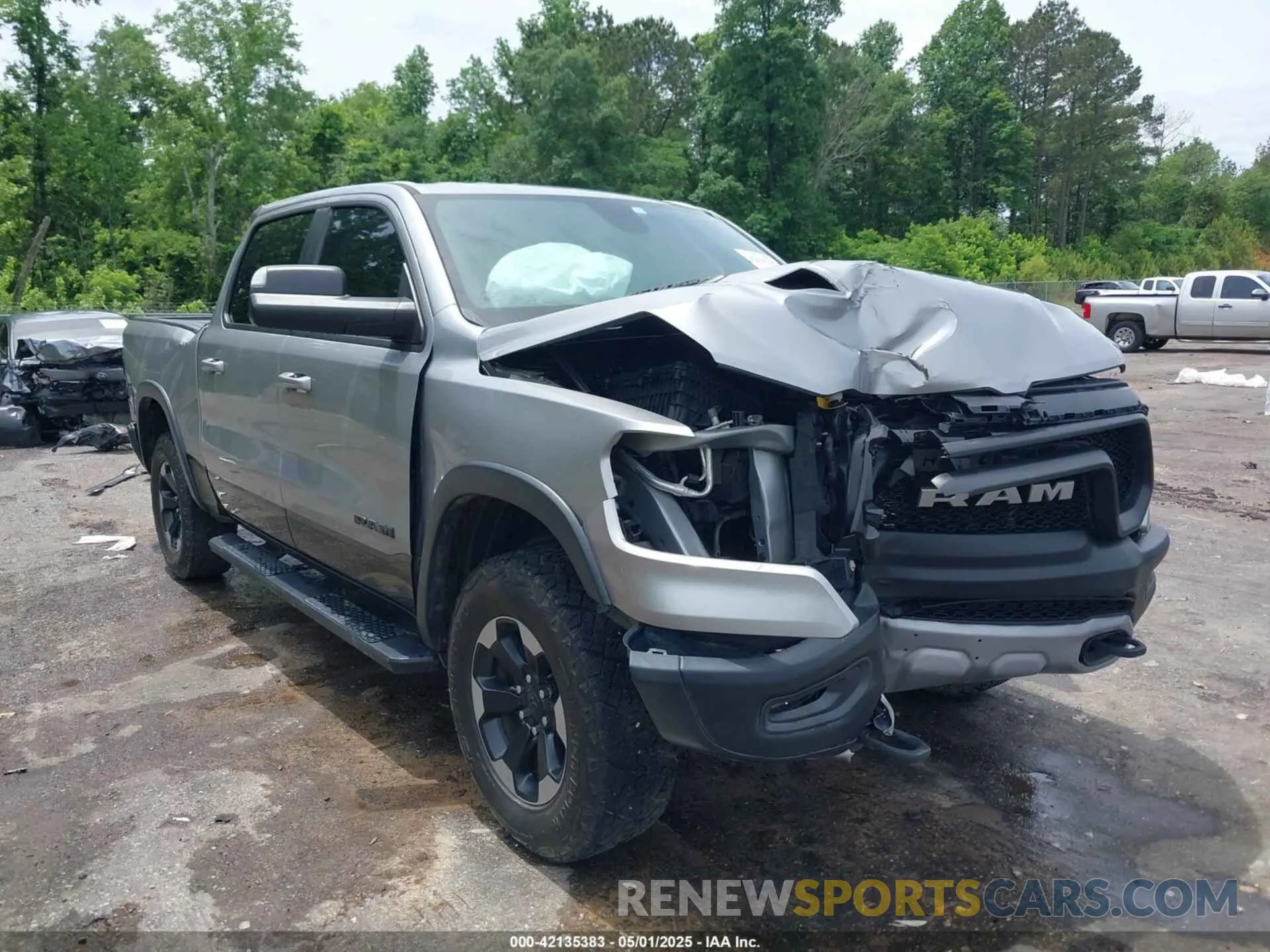 1 Photograph of a damaged car 1C6SRFLT8LN229872 RAM 1500 2020