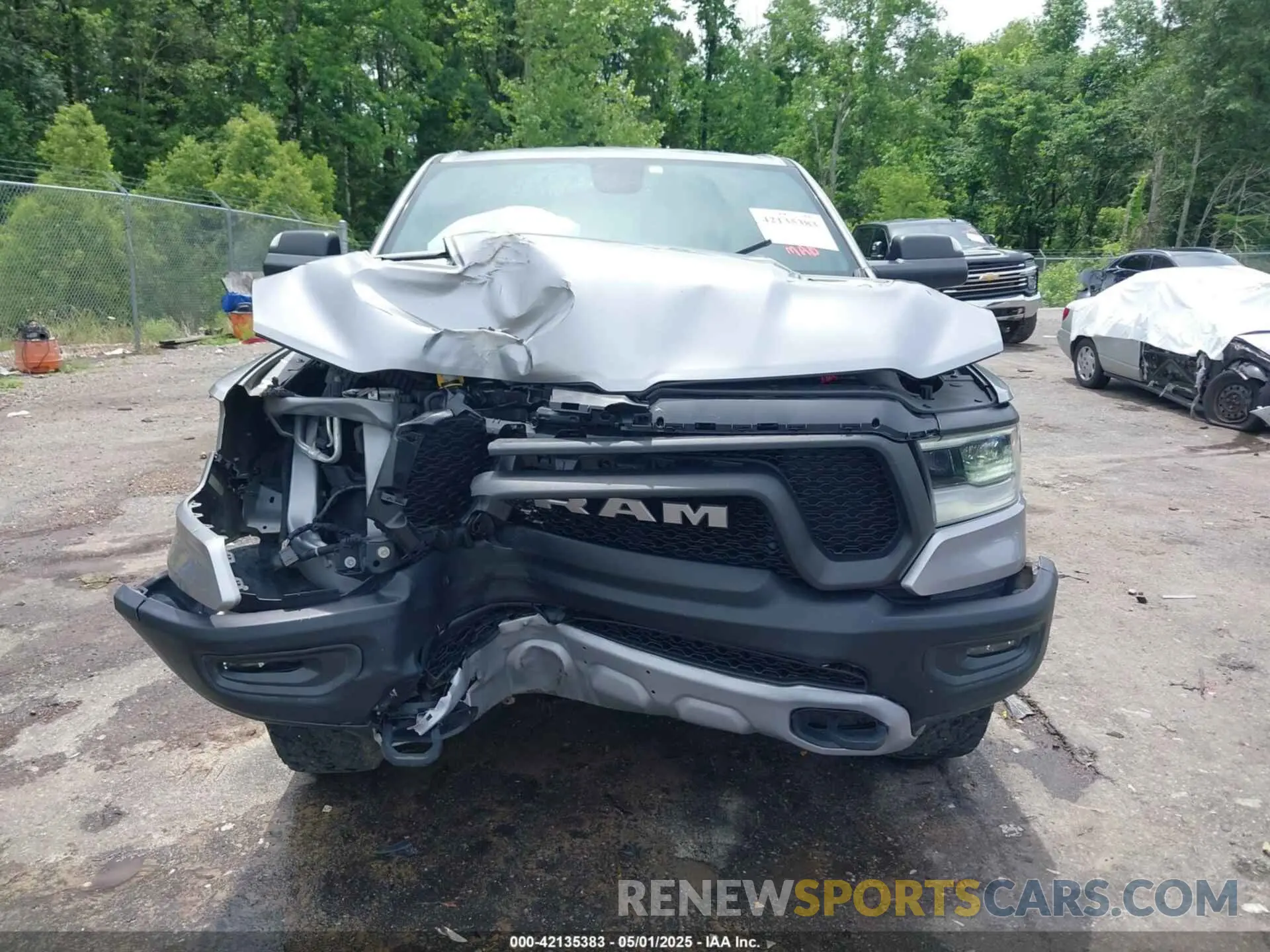 13 Photograph of a damaged car 1C6SRFLT8LN229872 RAM 1500 2020