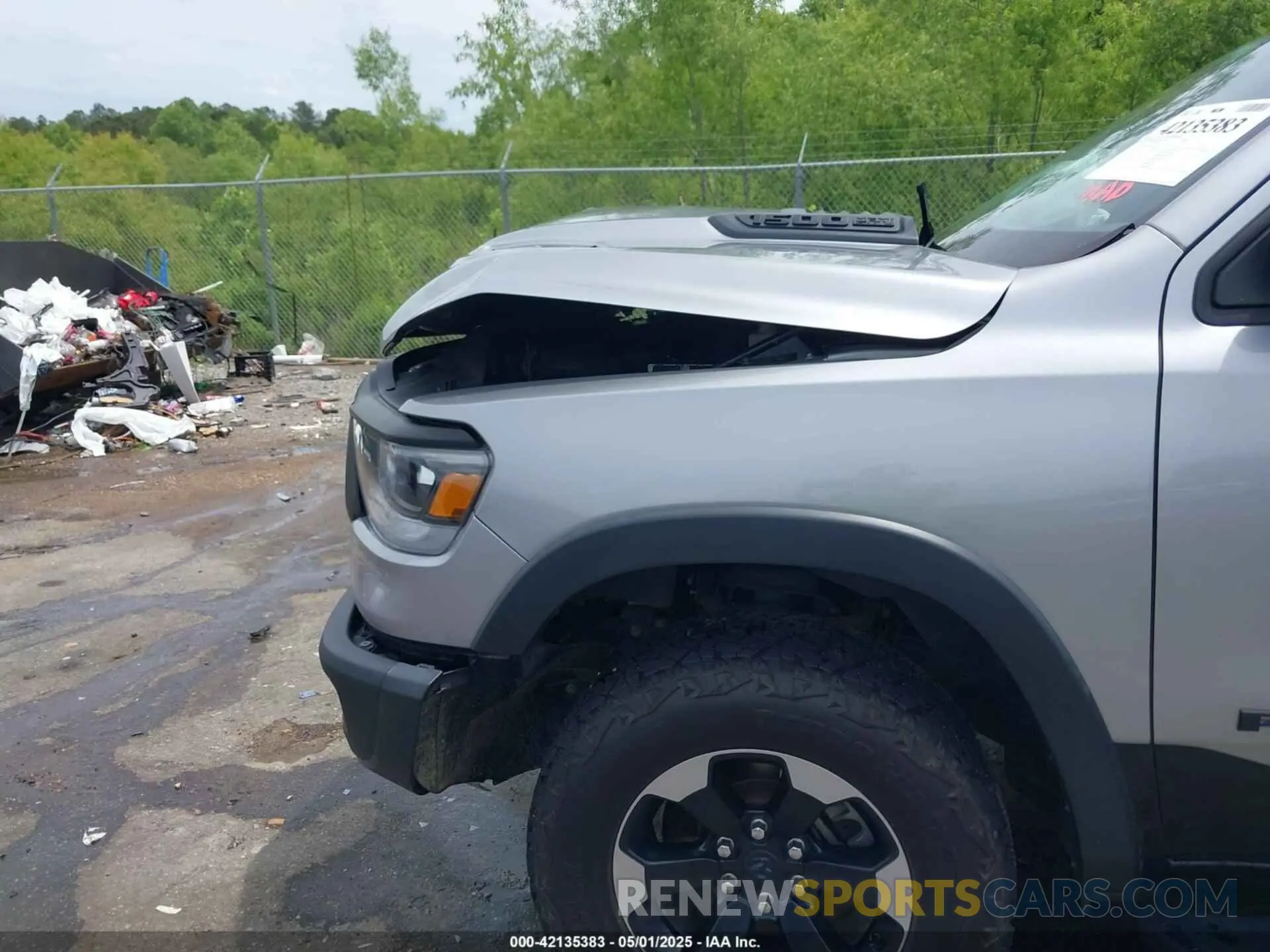 18 Photograph of a damaged car 1C6SRFLT8LN229872 RAM 1500 2020