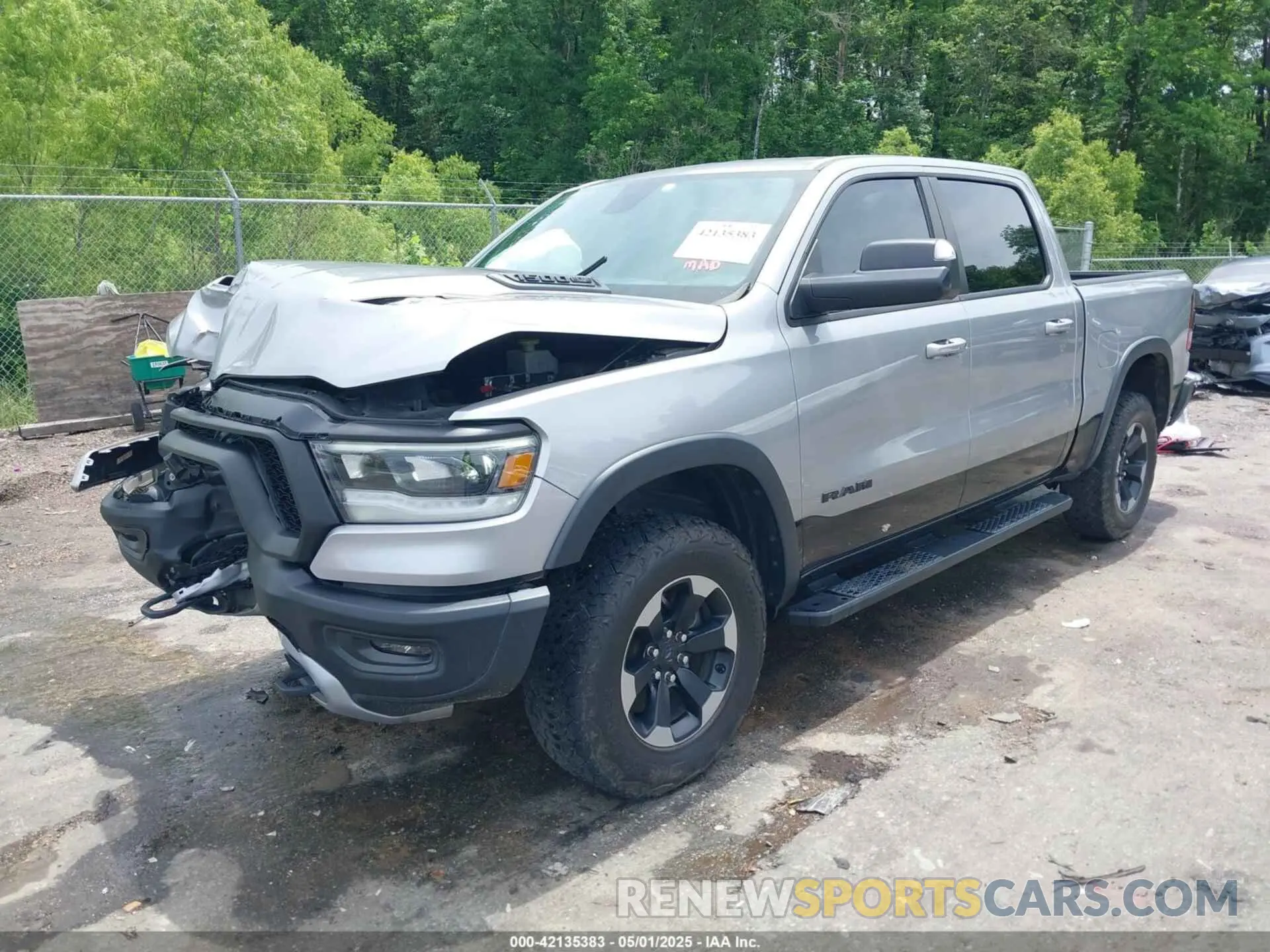 2 Photograph of a damaged car 1C6SRFLT8LN229872 RAM 1500 2020