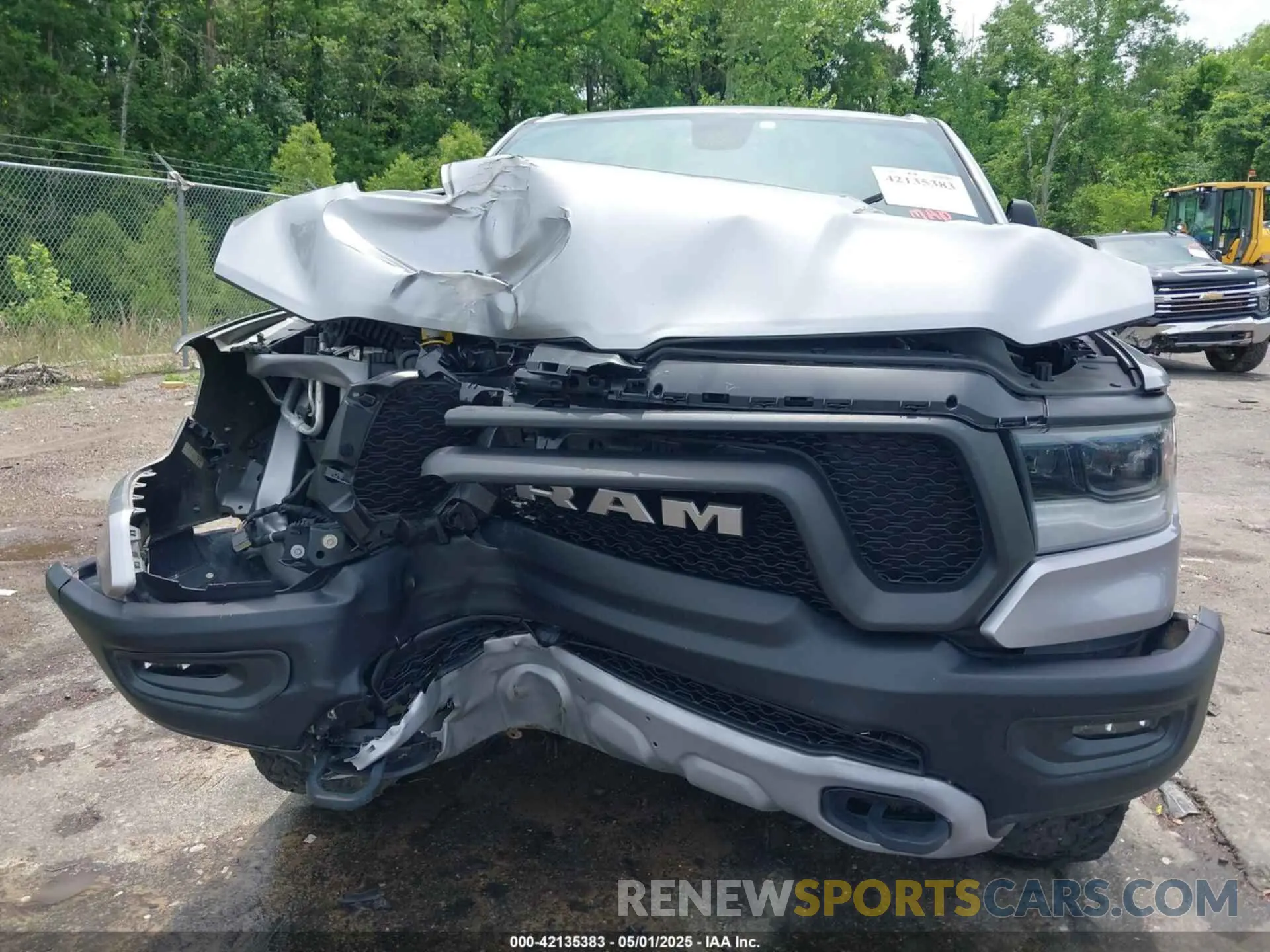 6 Photograph of a damaged car 1C6SRFLT8LN229872 RAM 1500 2020