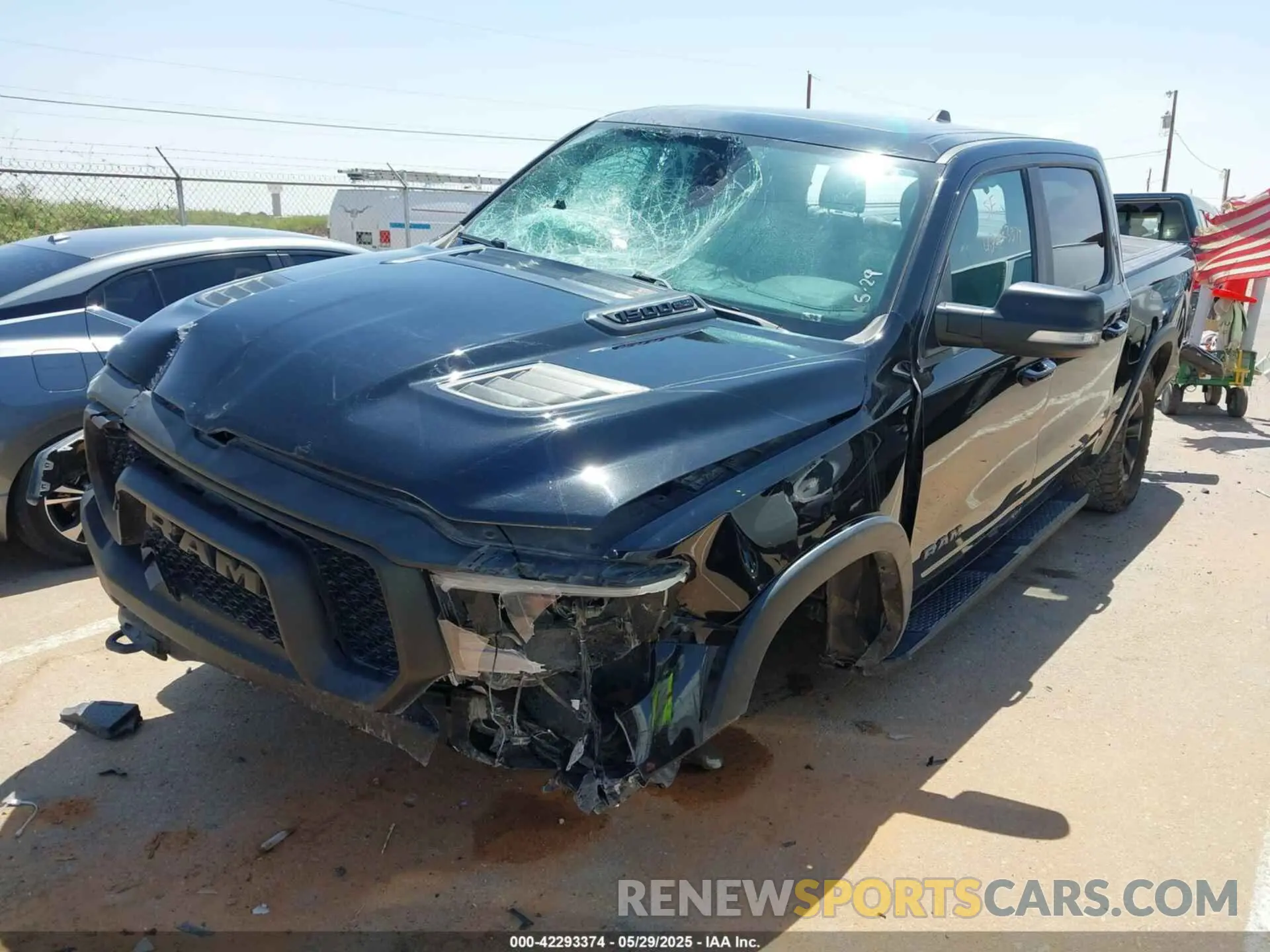 2 Photograph of a damaged car 1C6SRFLT8LN377312 RAM 1500 2020